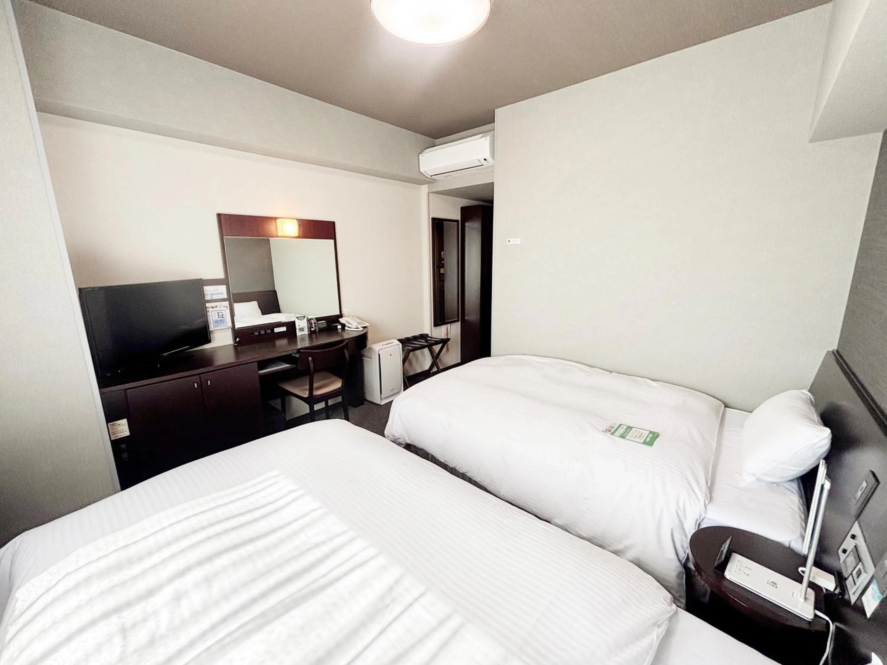 Photo of the whole room, Bed in Hotel Route-Inn Iyo-Saijo