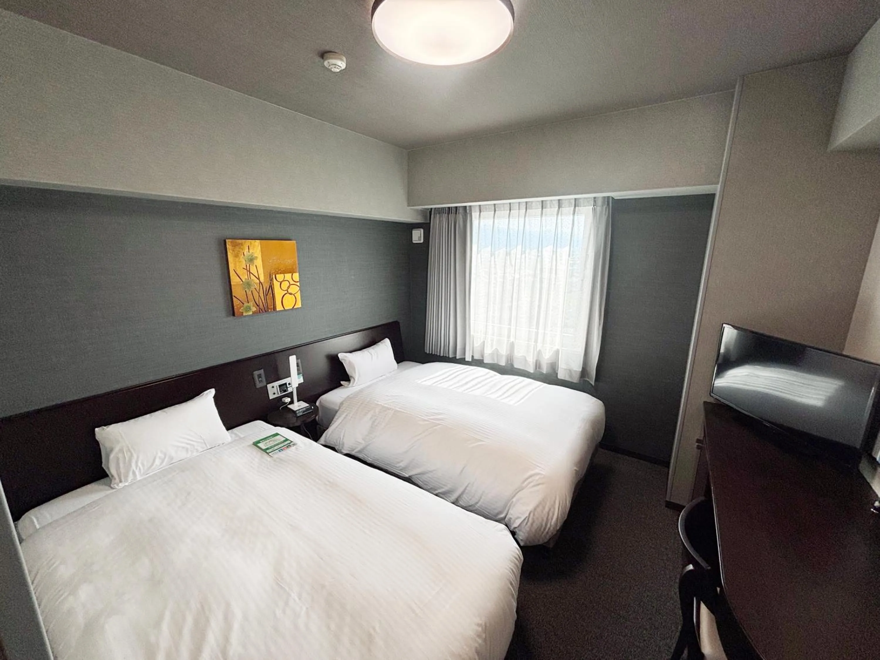 Photo of the whole room, Bed in Hotel Route-Inn Iyo-Saijo