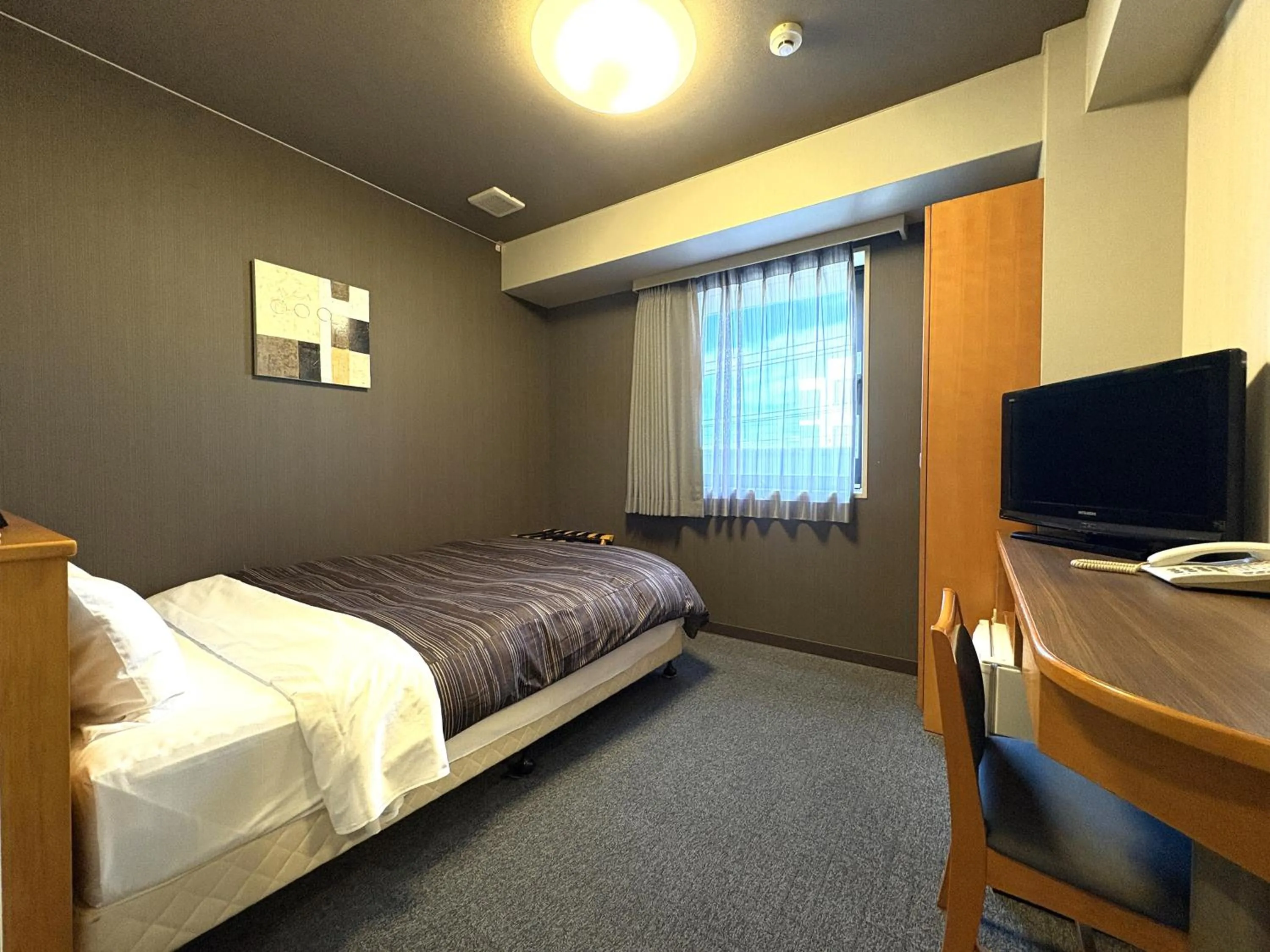 Photo of the whole room, Bed in Hotel Route-Inn Niihama