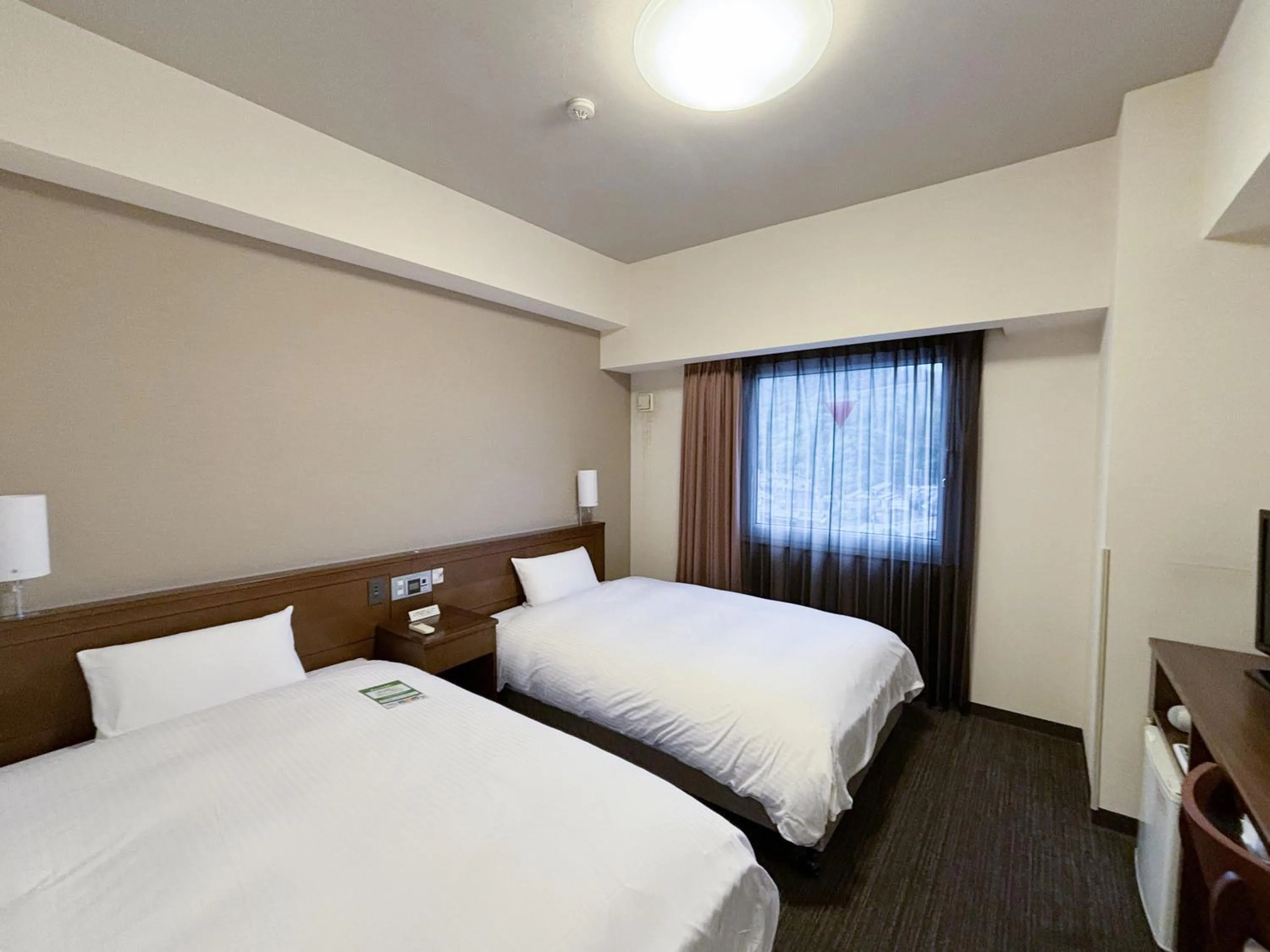 Photo of the whole room, Bed in Hotel Route-Inn Sakaide-Kita Inter