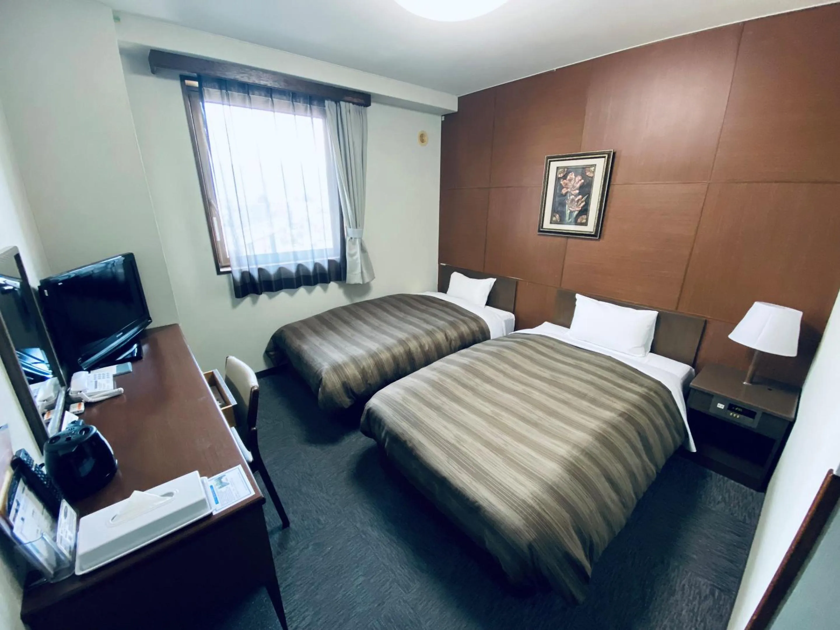 Photo of the whole room, Bed in Hotel Route-Inn Kamisuwa