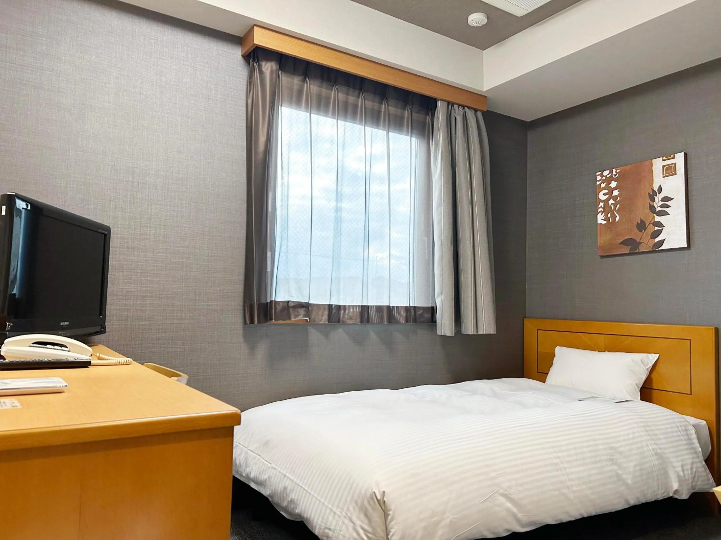 Photo of the whole room, Bed in Hotel Route-Inn Jouetsu