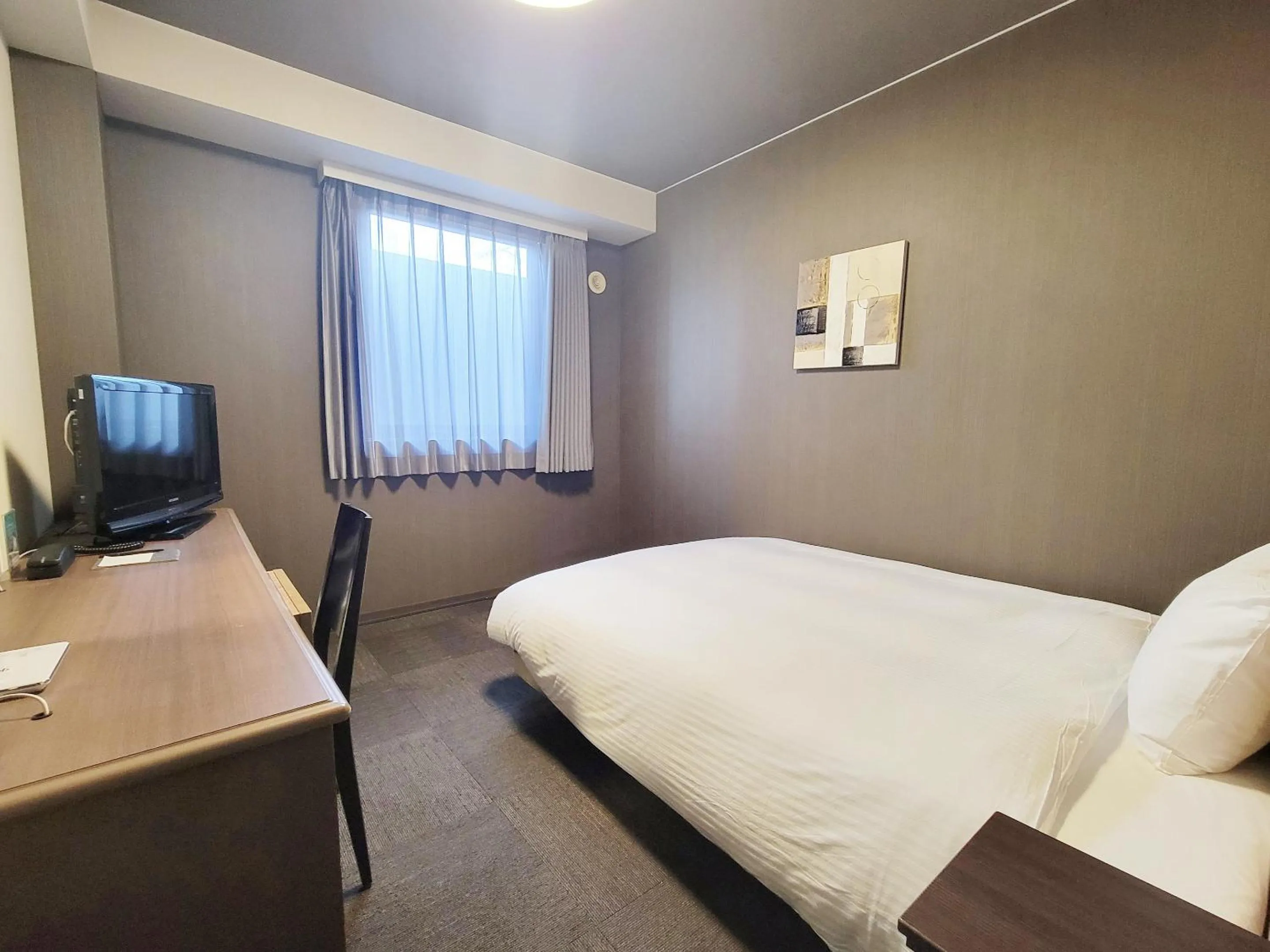 Photo of the whole room, Bed in Hotel Route-Inn Komoro
