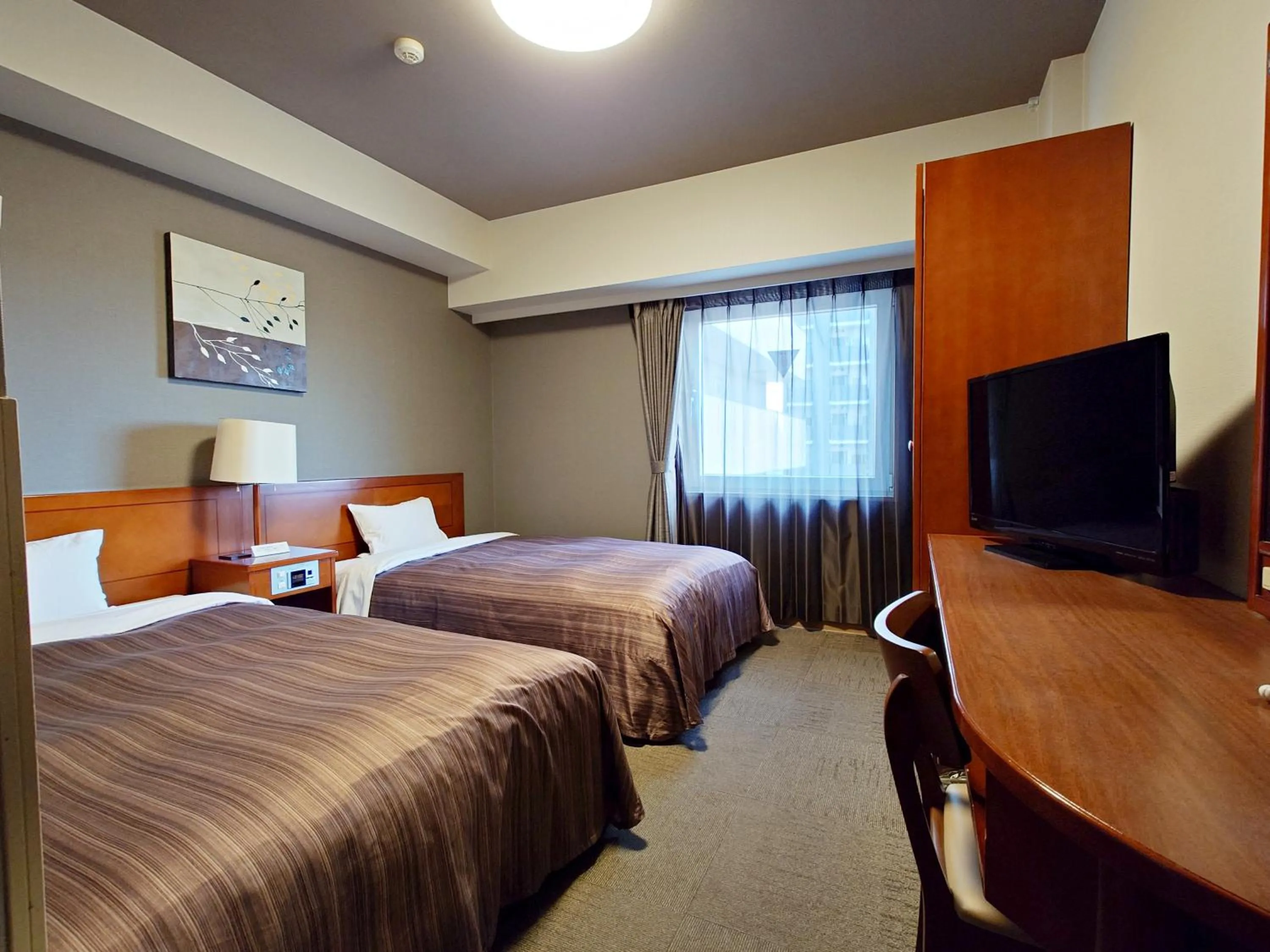 Photo of the whole room, Bed in Hotel Route-Inn Koga Ekimae