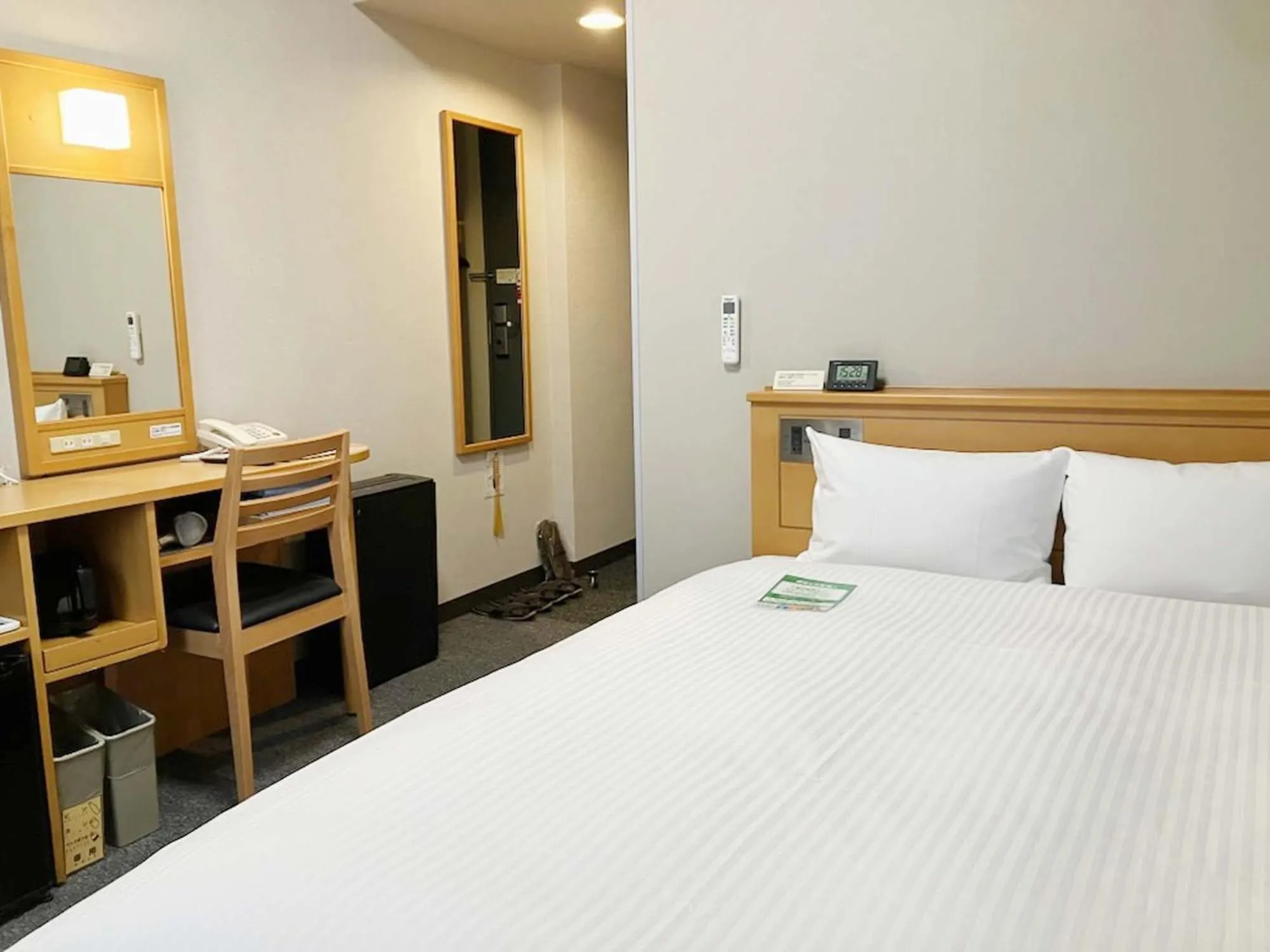 Photo of the whole room, Bed in Hotel Route-Inn Kitakami Ekimae