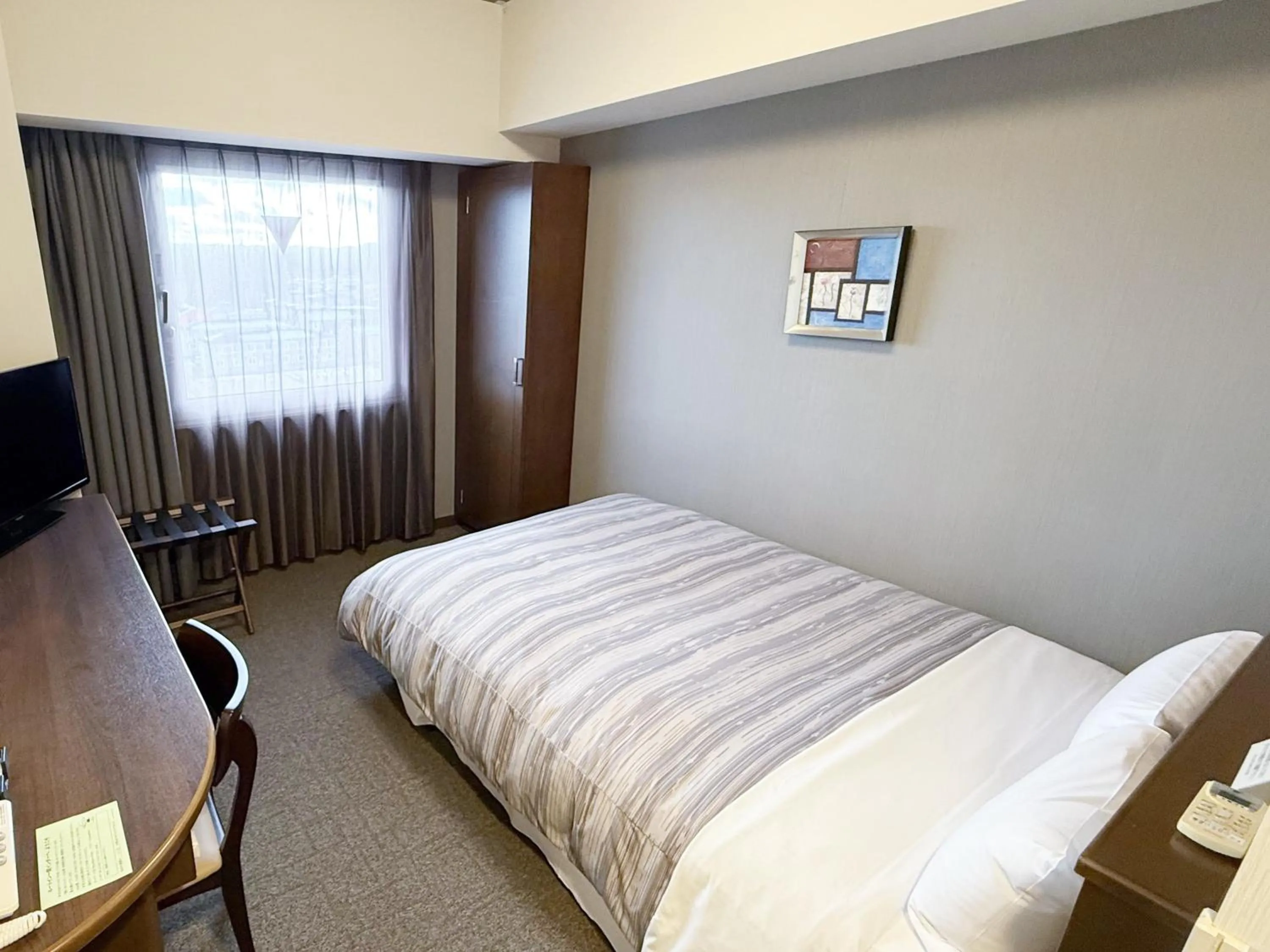 Photo of the whole room, Bed in Hotel Route-Inn Ichinoseki Inter