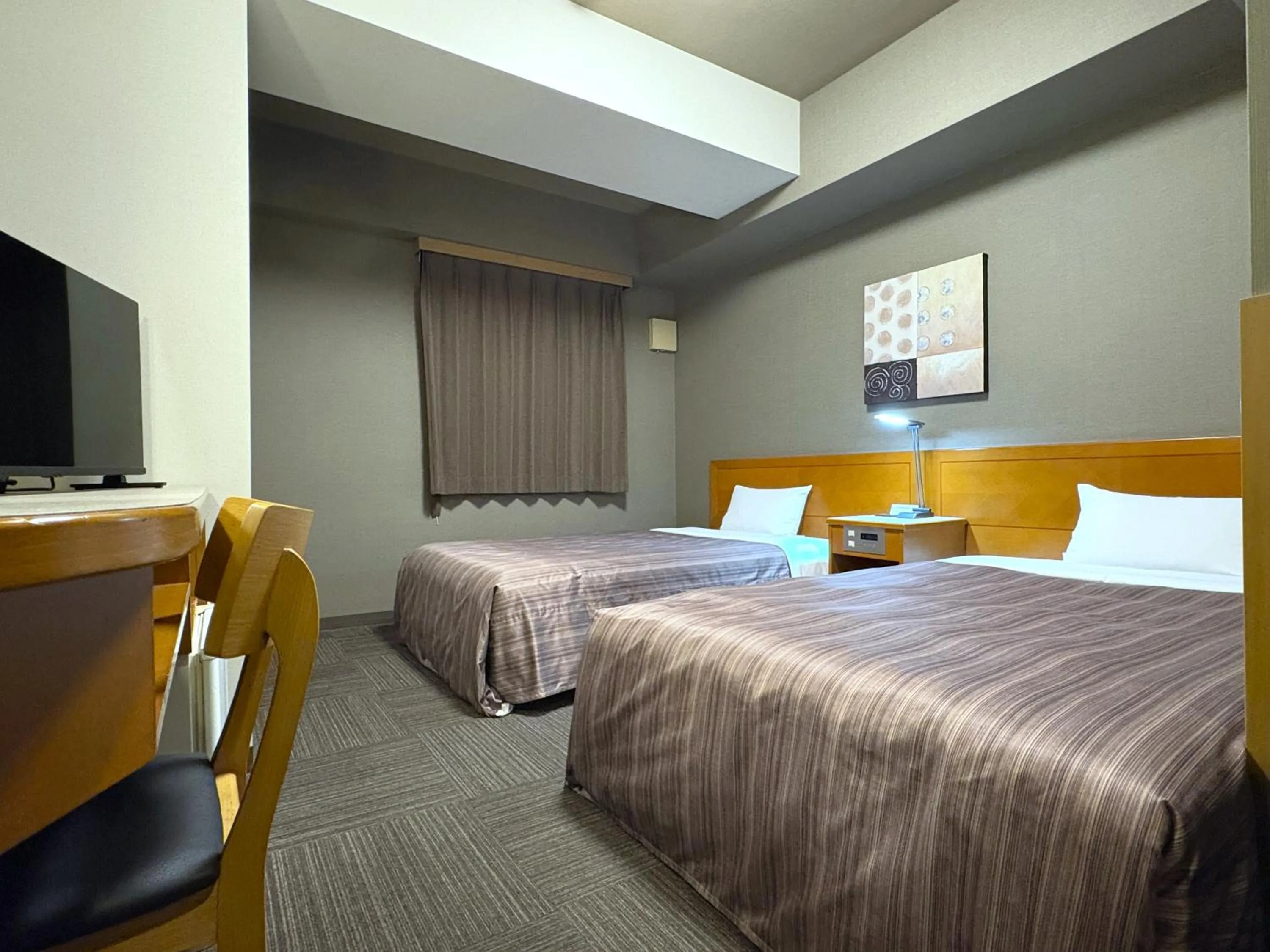 Photo of the whole room, Bed in Hotel Route-Inn Honjo Ekiminami