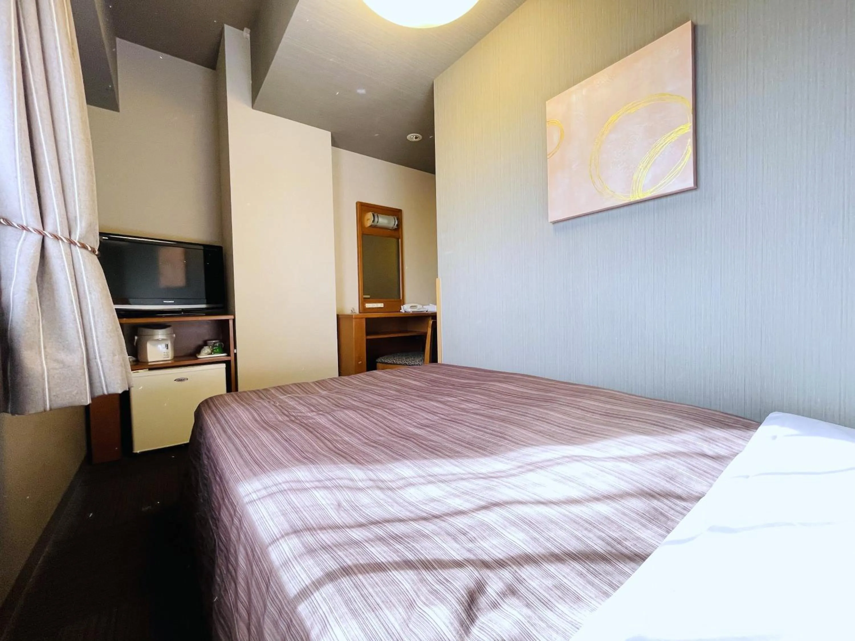 Photo of the whole room, Bed in Hotel Route-Inn Honjo Ekiminami