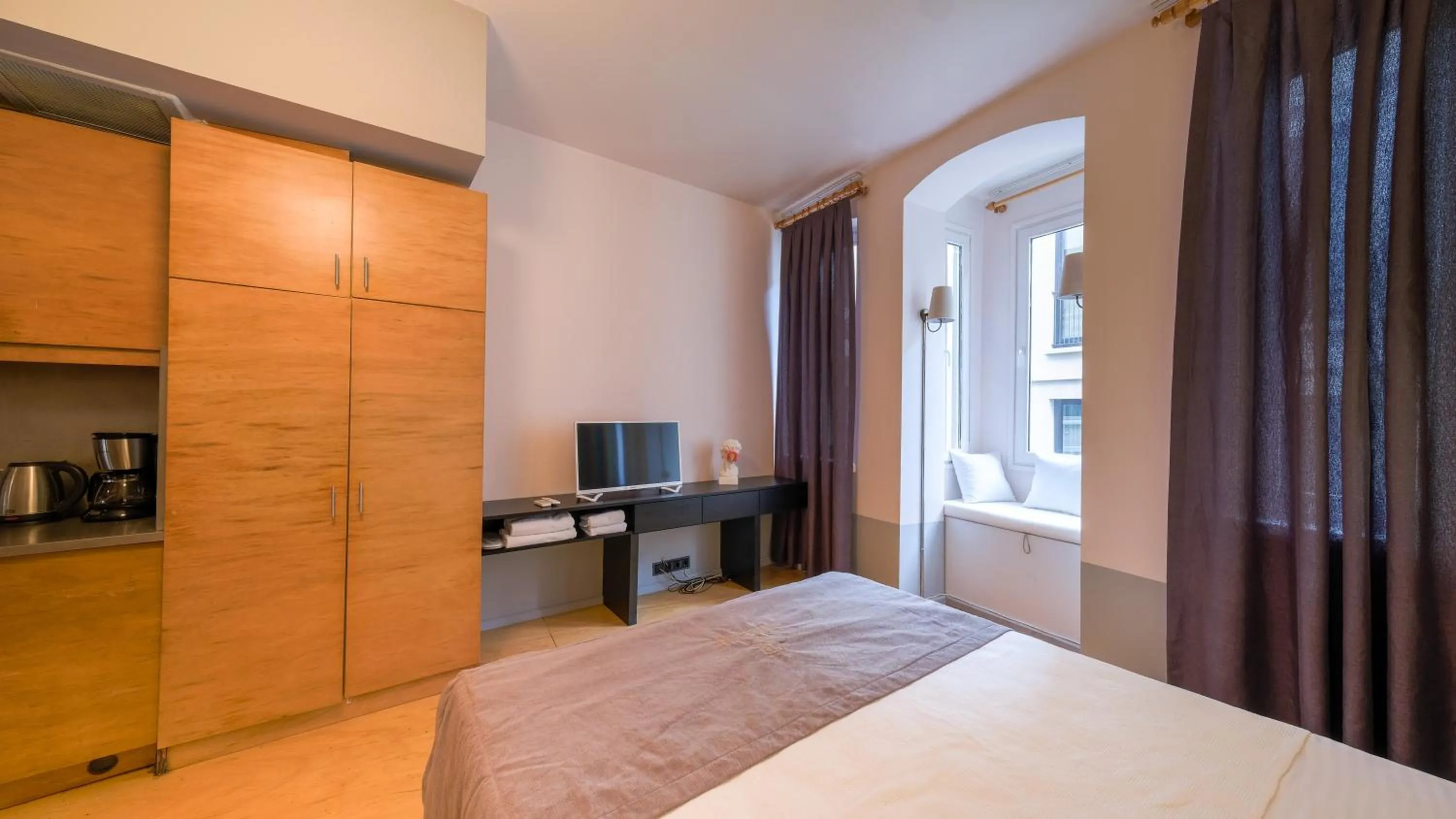 Bed in Mayer Loft Suites