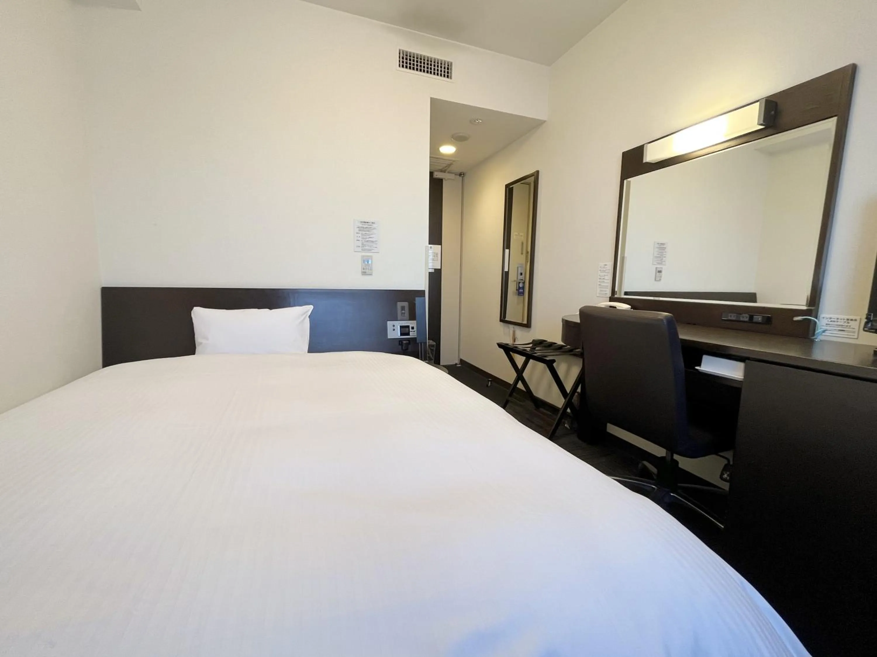 Photo of the whole room, Bed in Hotel Route-Inn Kushiro Ekimae