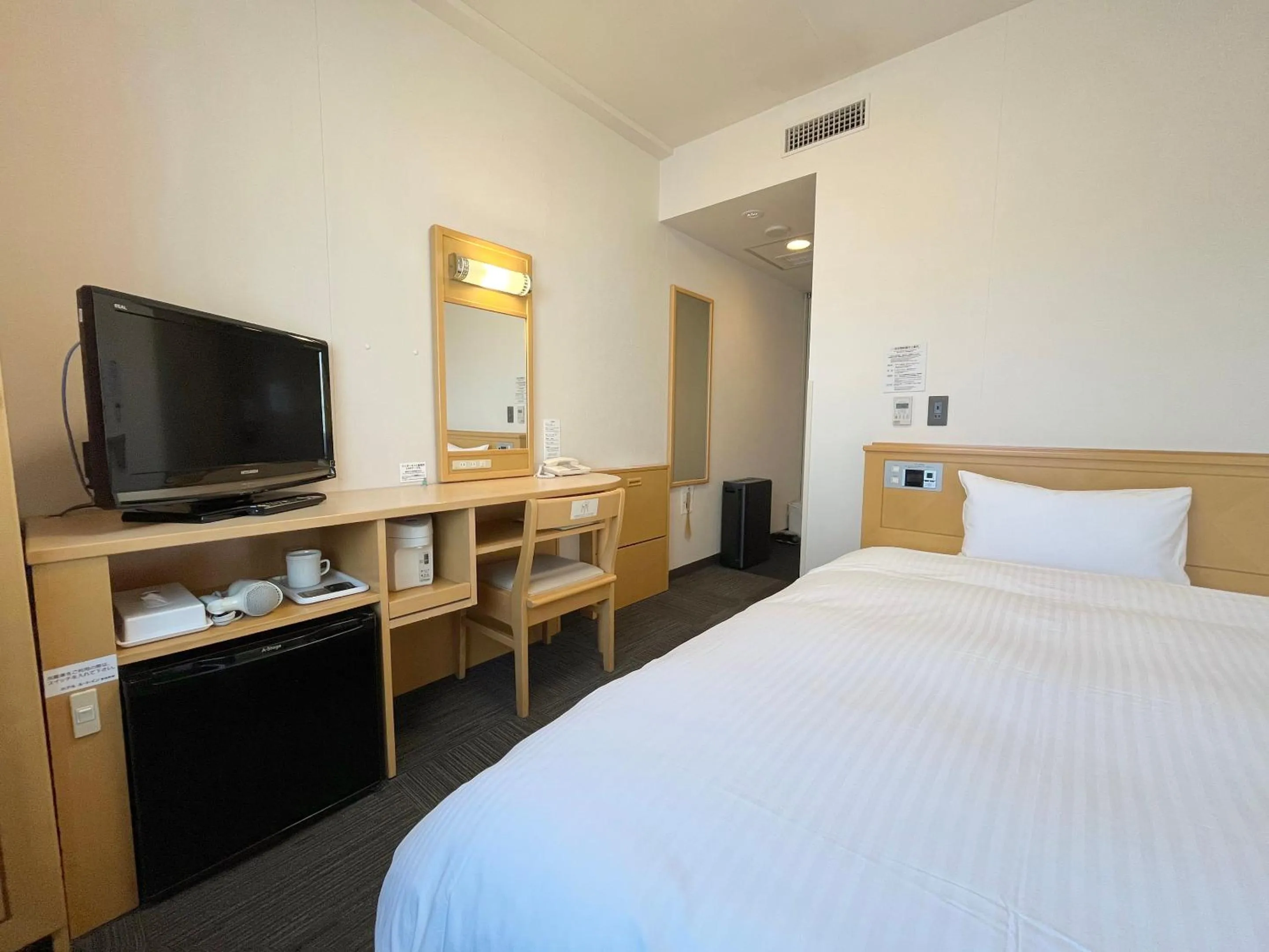 Photo of the whole room, Bed in Hotel Route-Inn Kushiro Ekimae