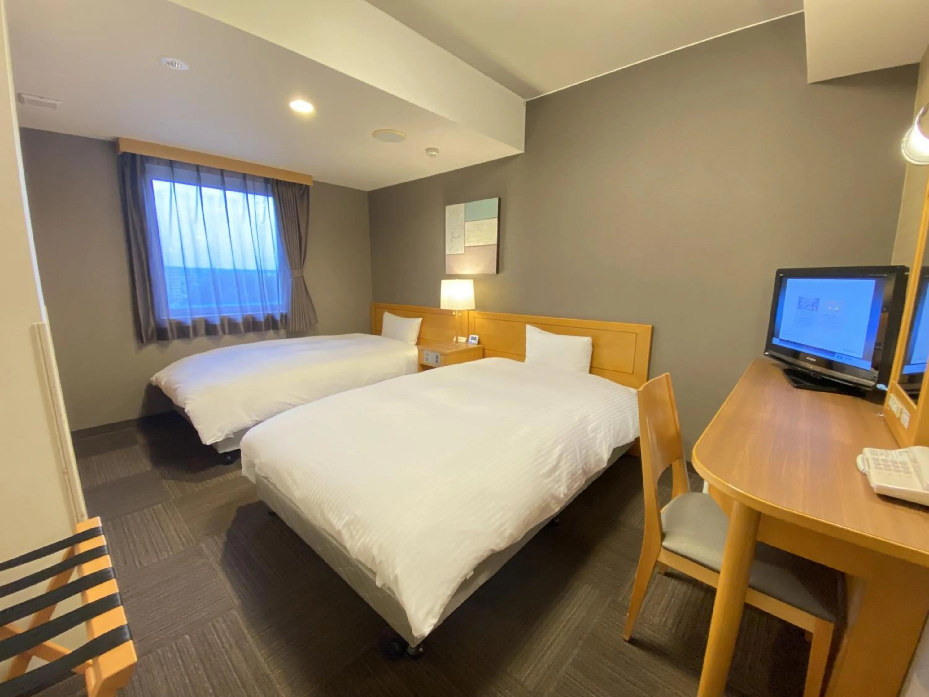 Bed in Hotel Route-Inn Hon Hachinohe Ekimae