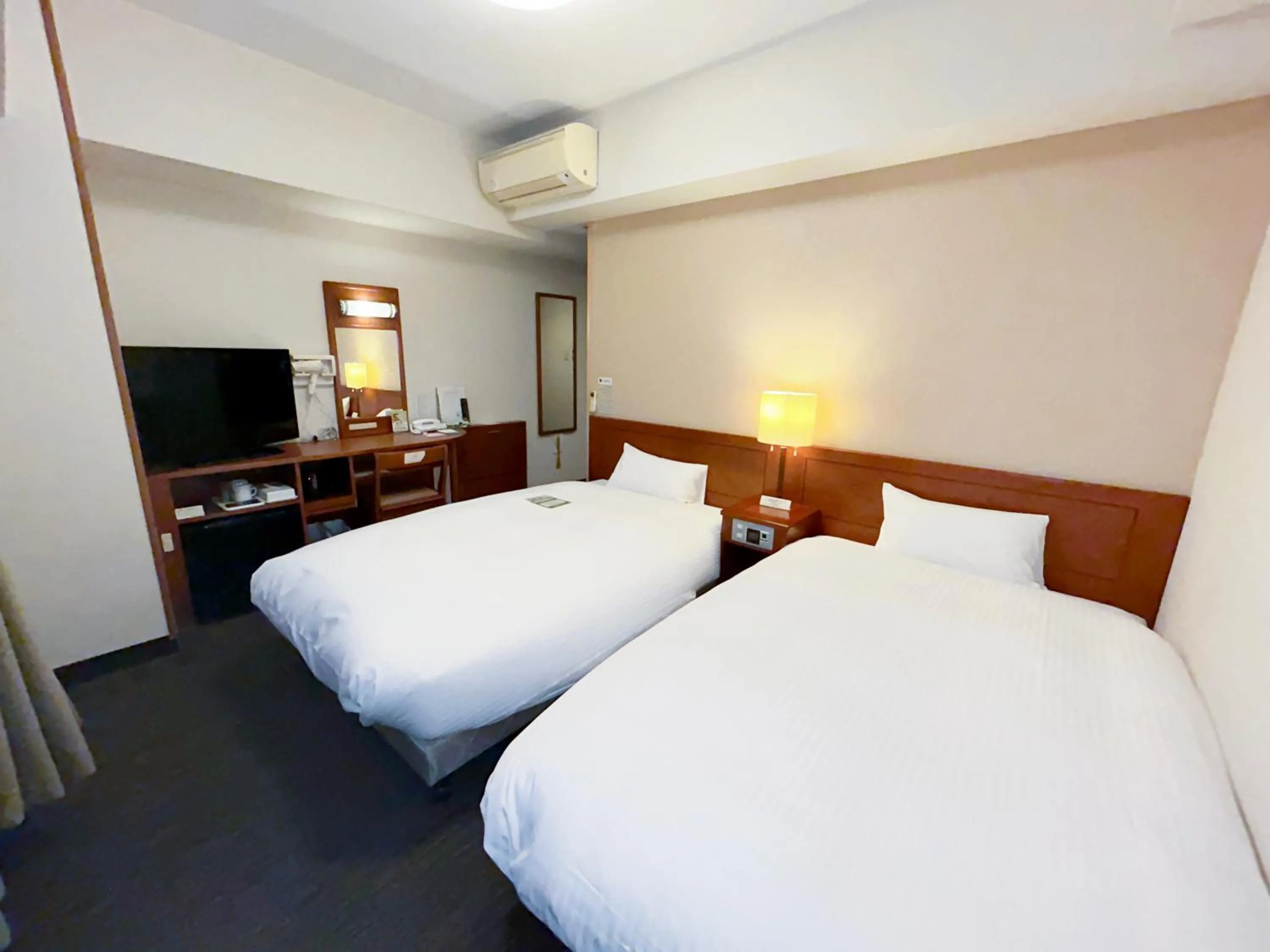 Photo of the whole room, Bed in Hotel Route-Inn Tosu Ekimae