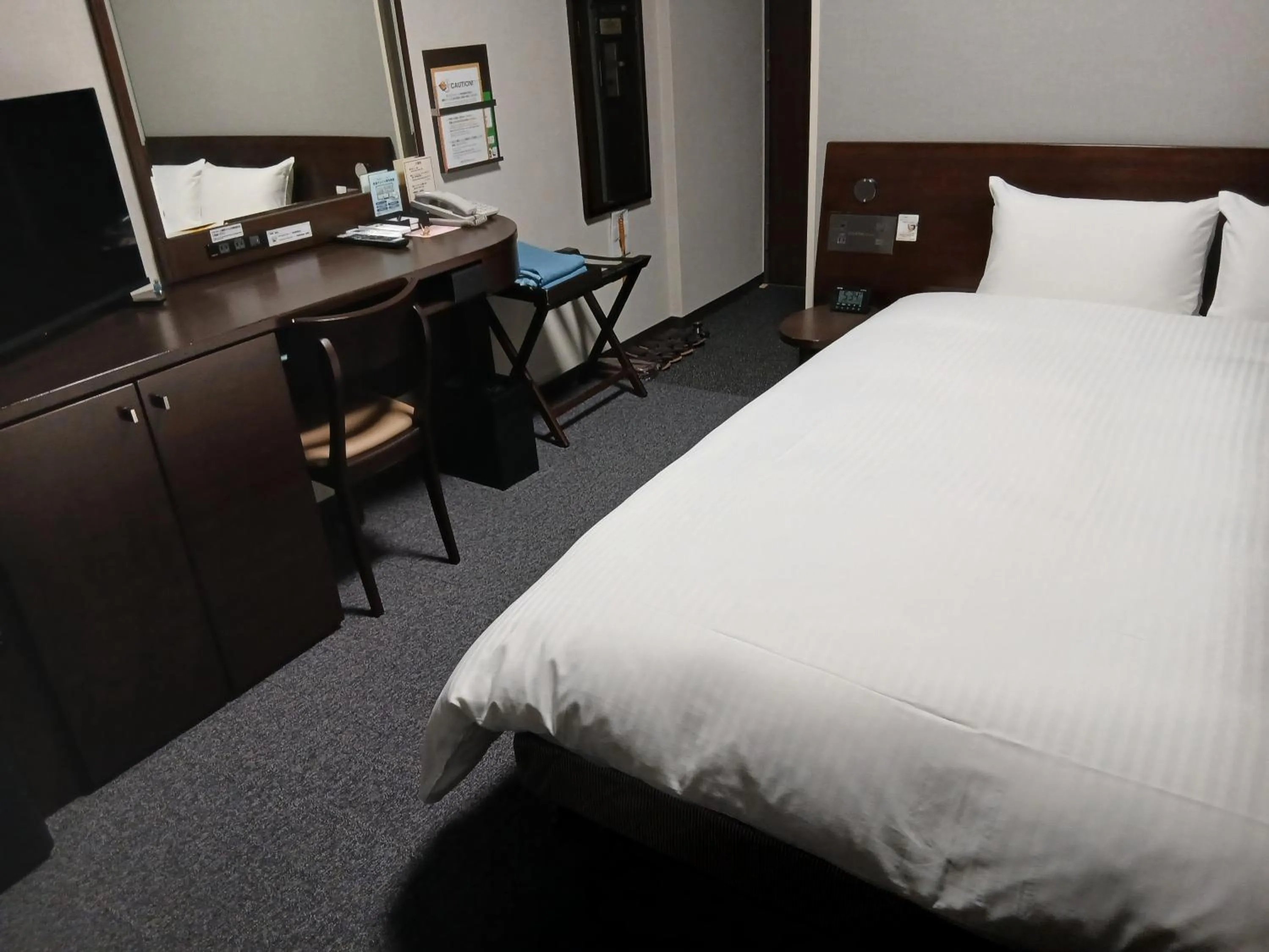 Bed in Hotel Route-Inn Saga Ekimae