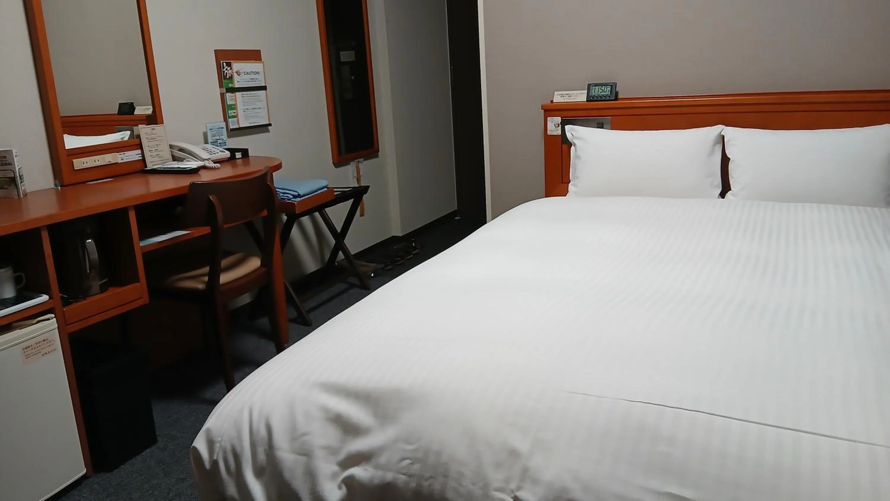 Bed in Hotel Route-Inn Saga Ekimae