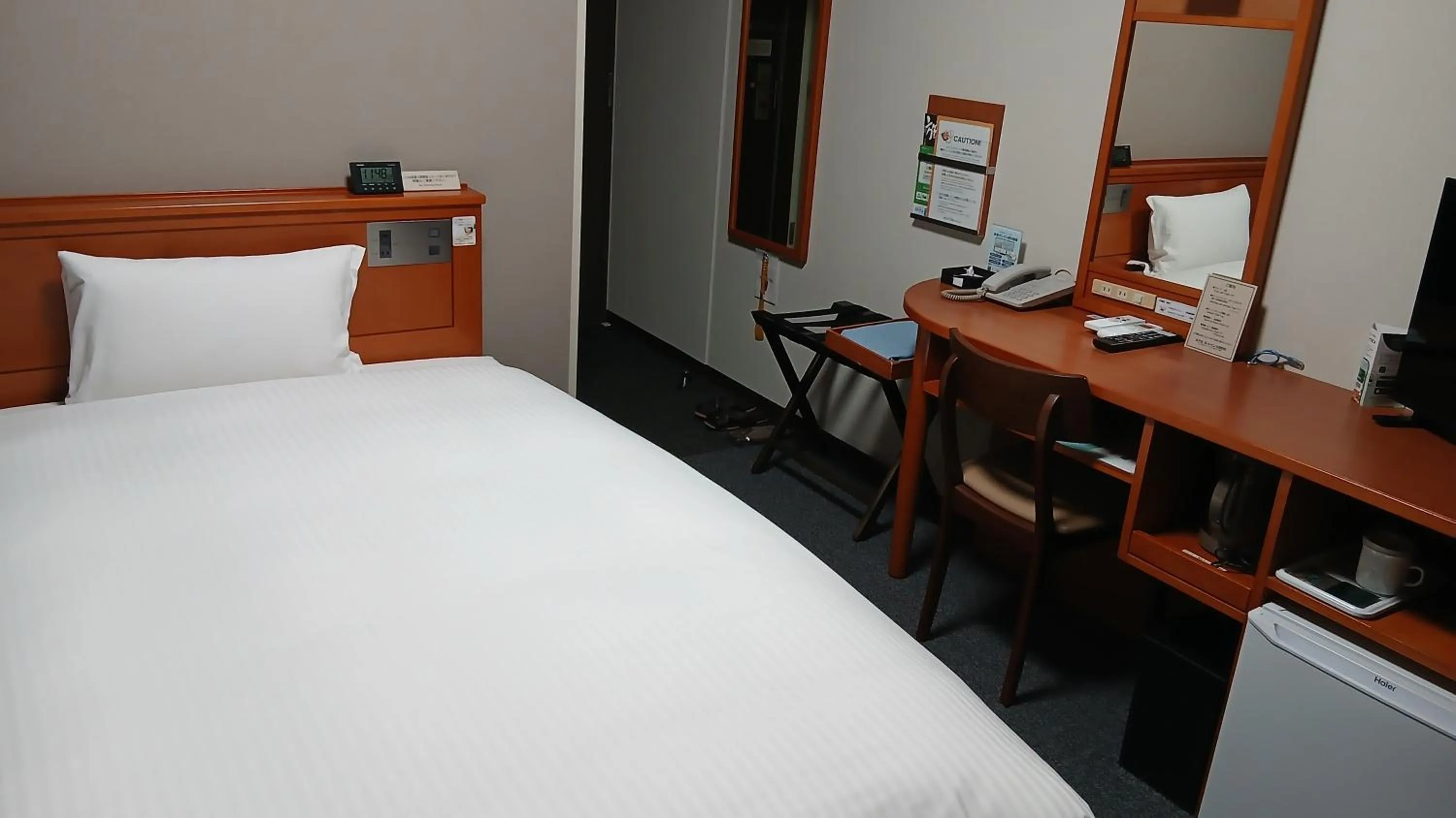 Photo of the whole room, Bed in Hotel Route-Inn Saga Ekimae