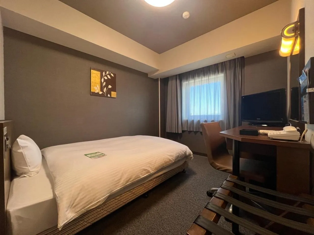 Photo of the whole room, Bed in Hotel Route-Inn Niigata Nishi Inter