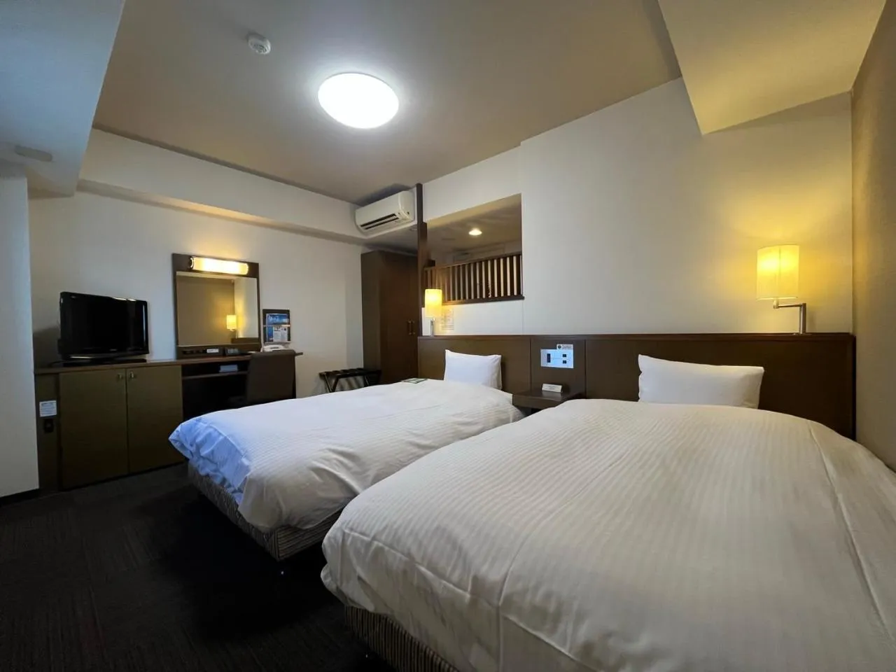 Photo of the whole room, Bed in Hotel Route-Inn Niigata Nishi Inter