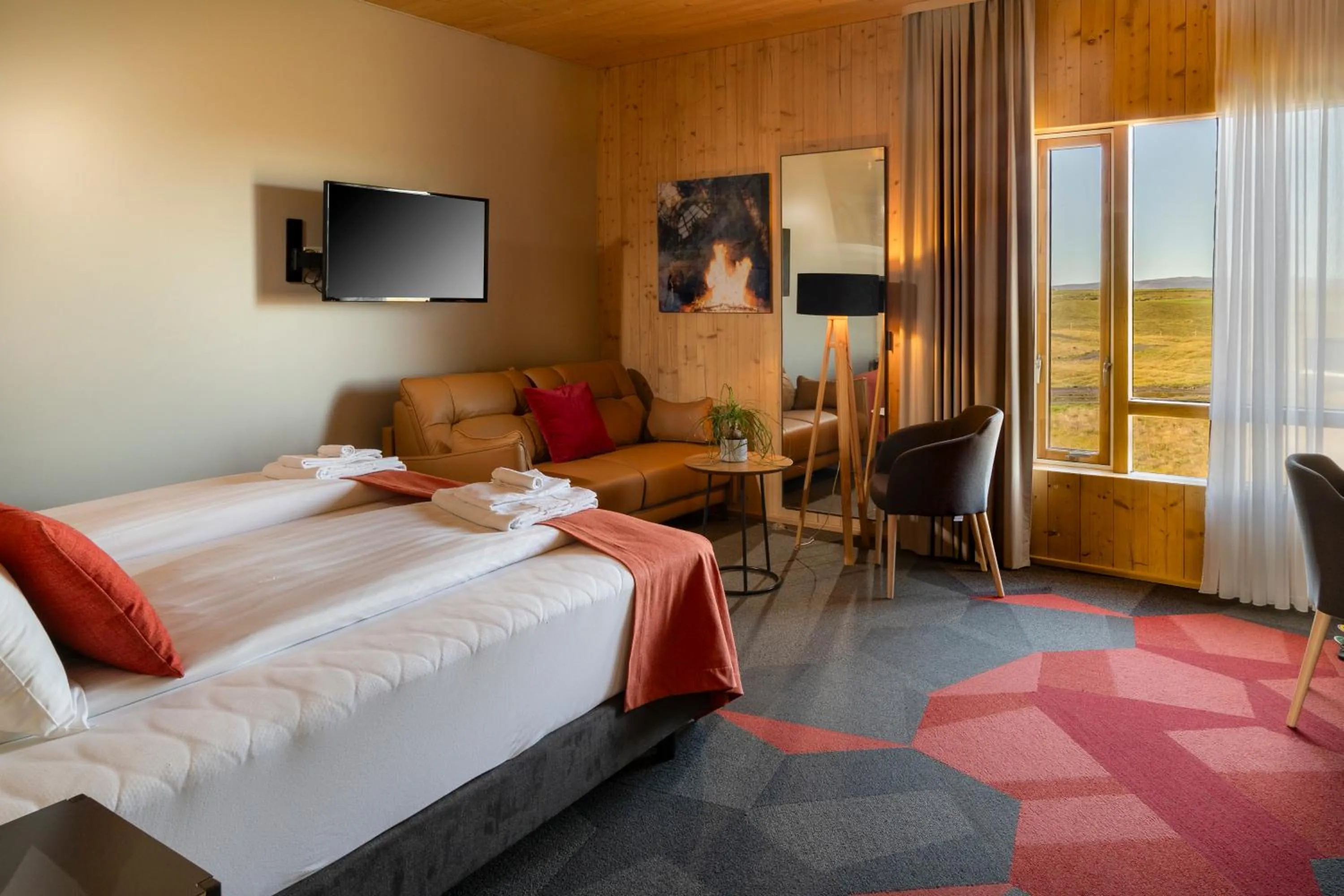 Living room, Bed in Landhotel