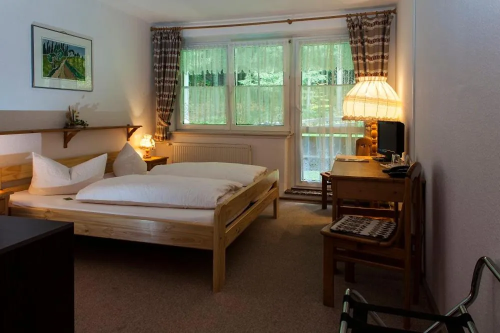 Bed in Hotel Rodebachmühle