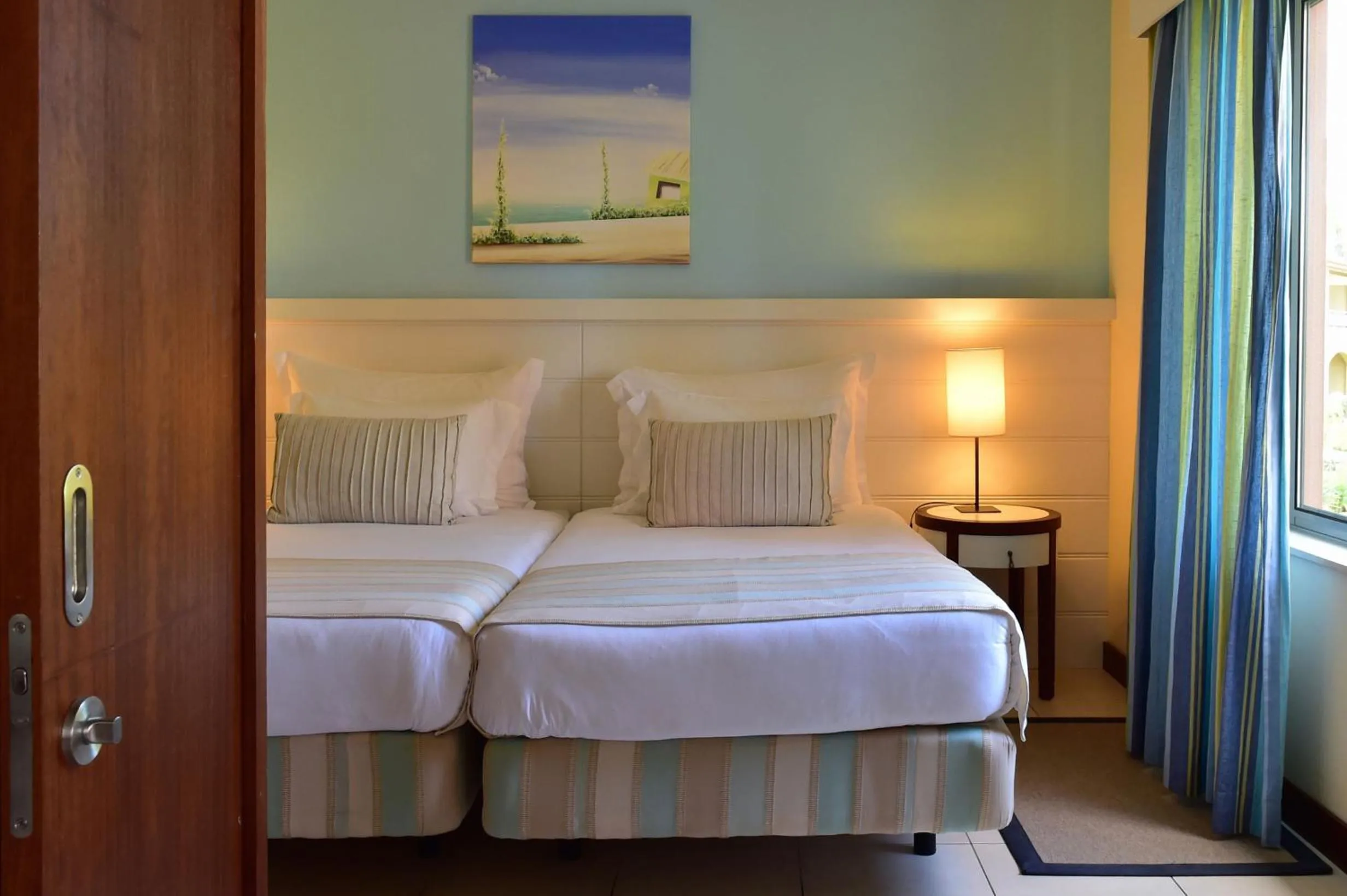 Bed in Pestana Porto Santo Premium All Inclusive Beach & SPA Resort