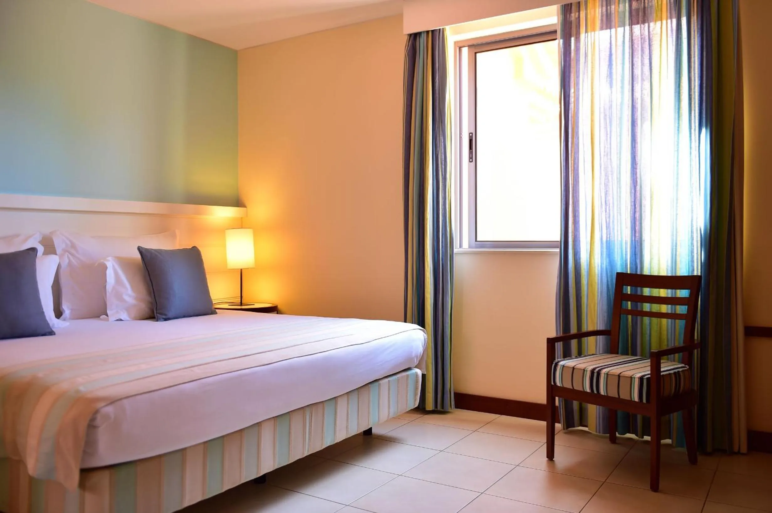 Bed in Pestana Porto Santo Premium All Inclusive Beach & SPA Resort