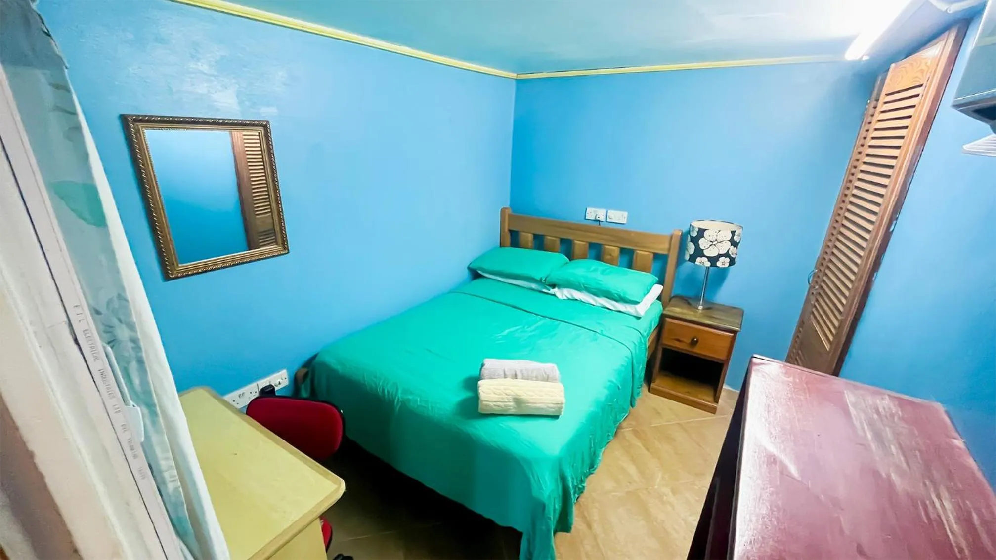 Bed in Coco Mango Suites