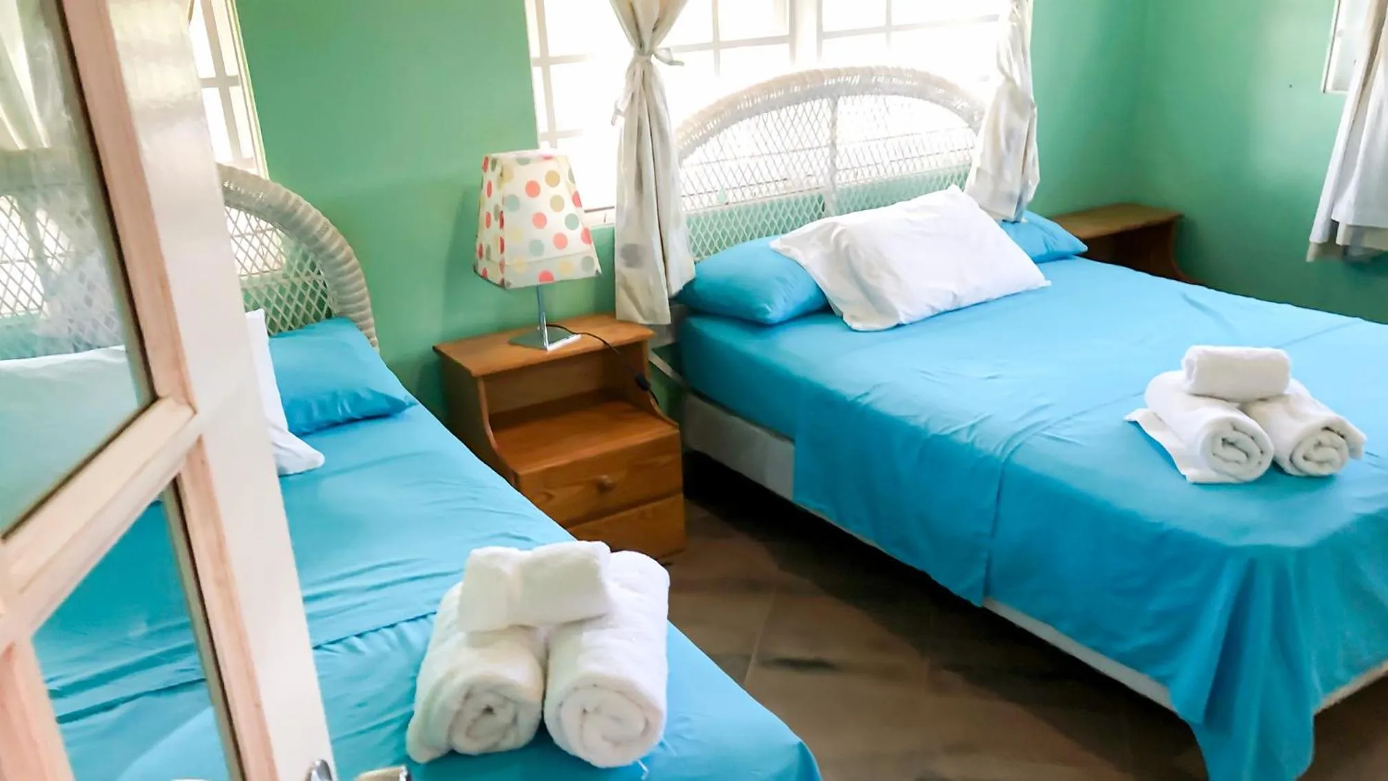 Bed in Coco Mango Suites