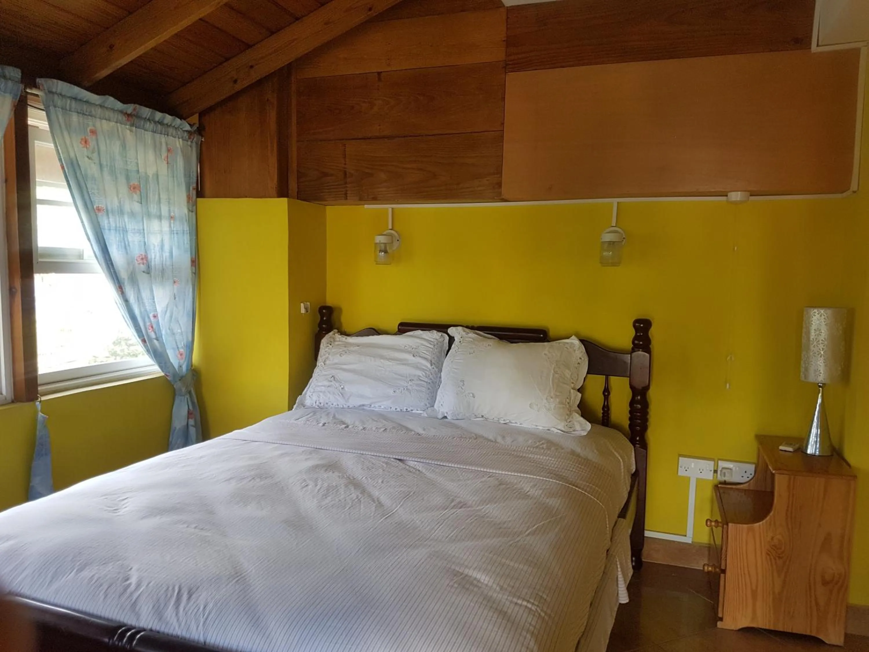 Bed in Coco Mango Suites