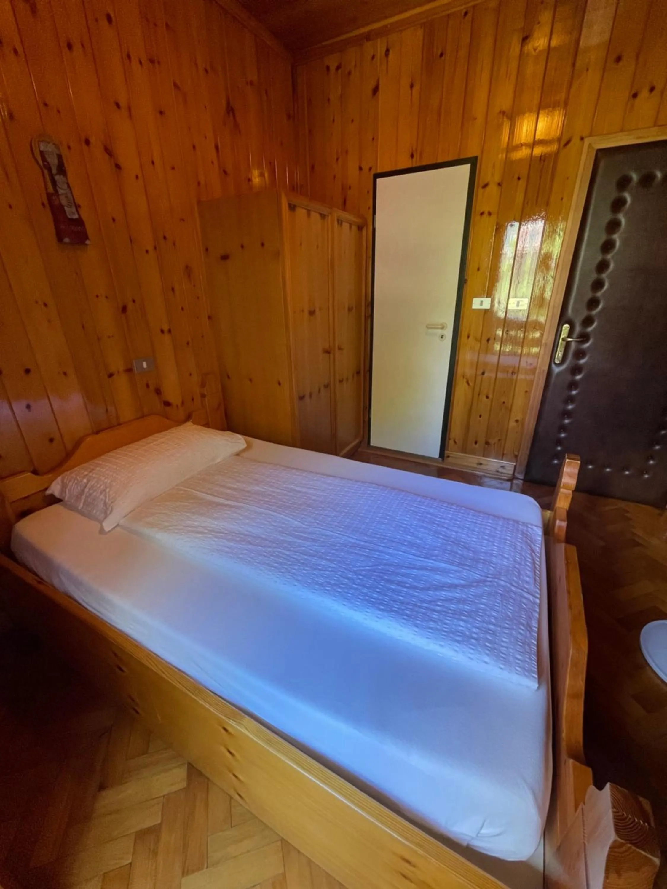 Bed in Villaggio Hotel Aquila