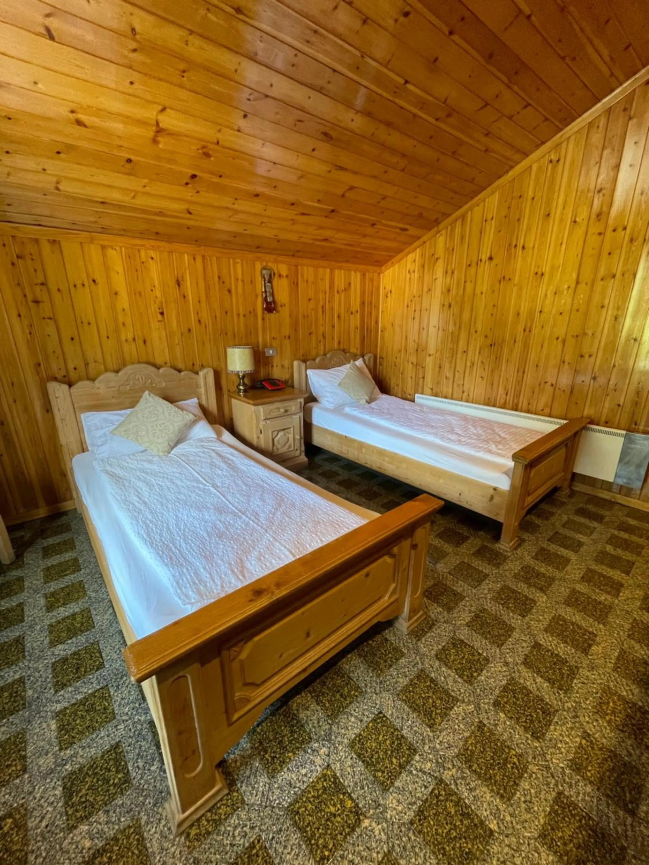 Bed in Villaggio Hotel Aquila