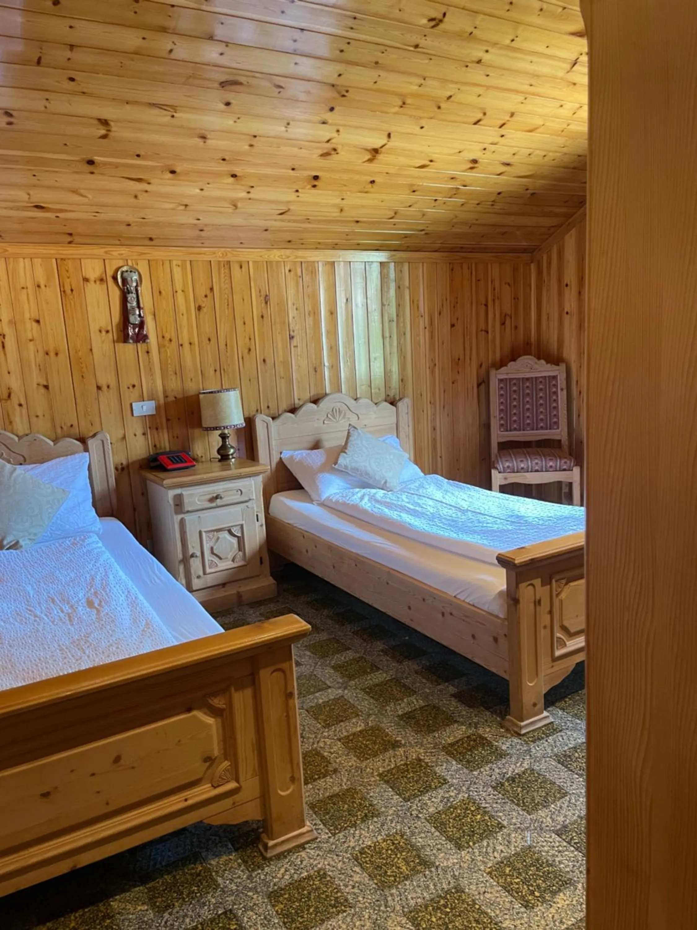 Bed in Villaggio Hotel Aquila