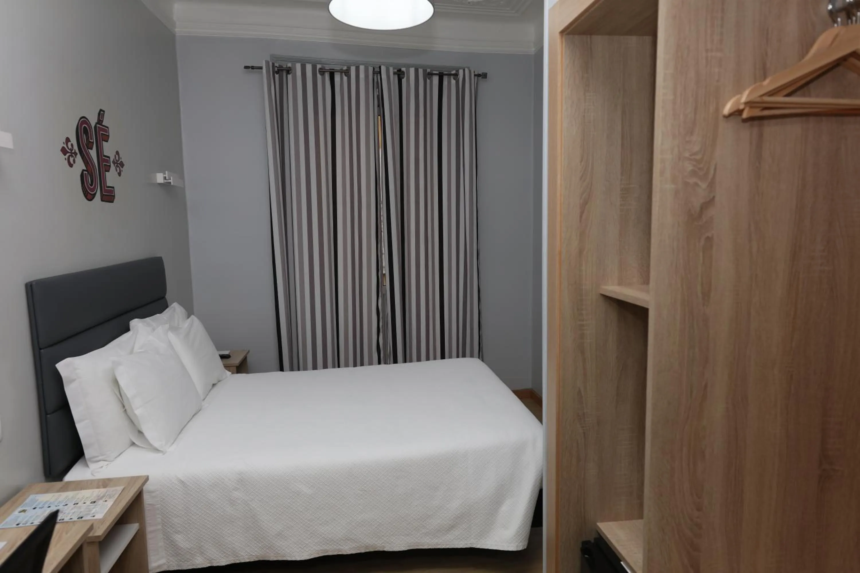 Bed in O Elétrico Guesthouse