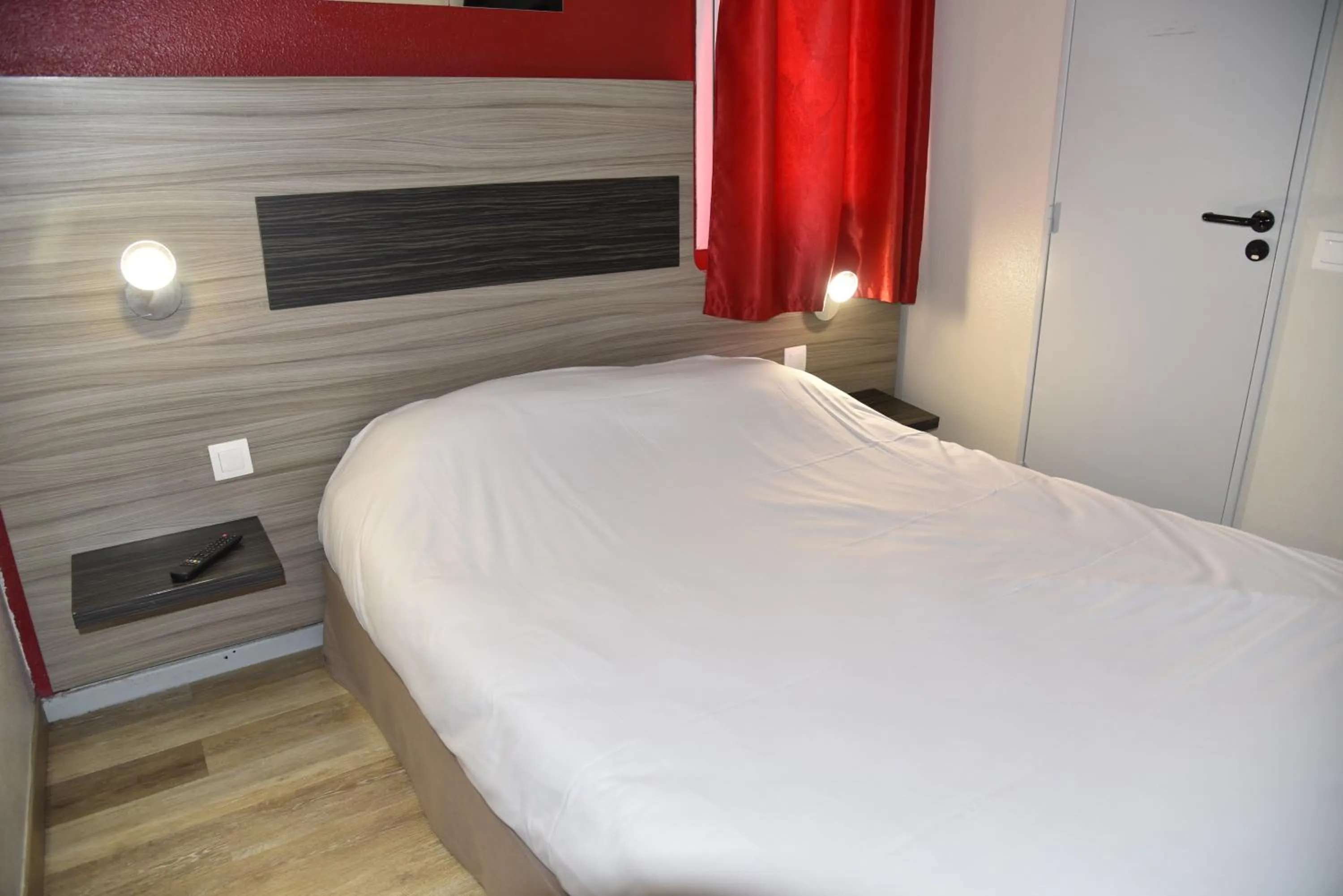 Bed in Hotel du Triangle