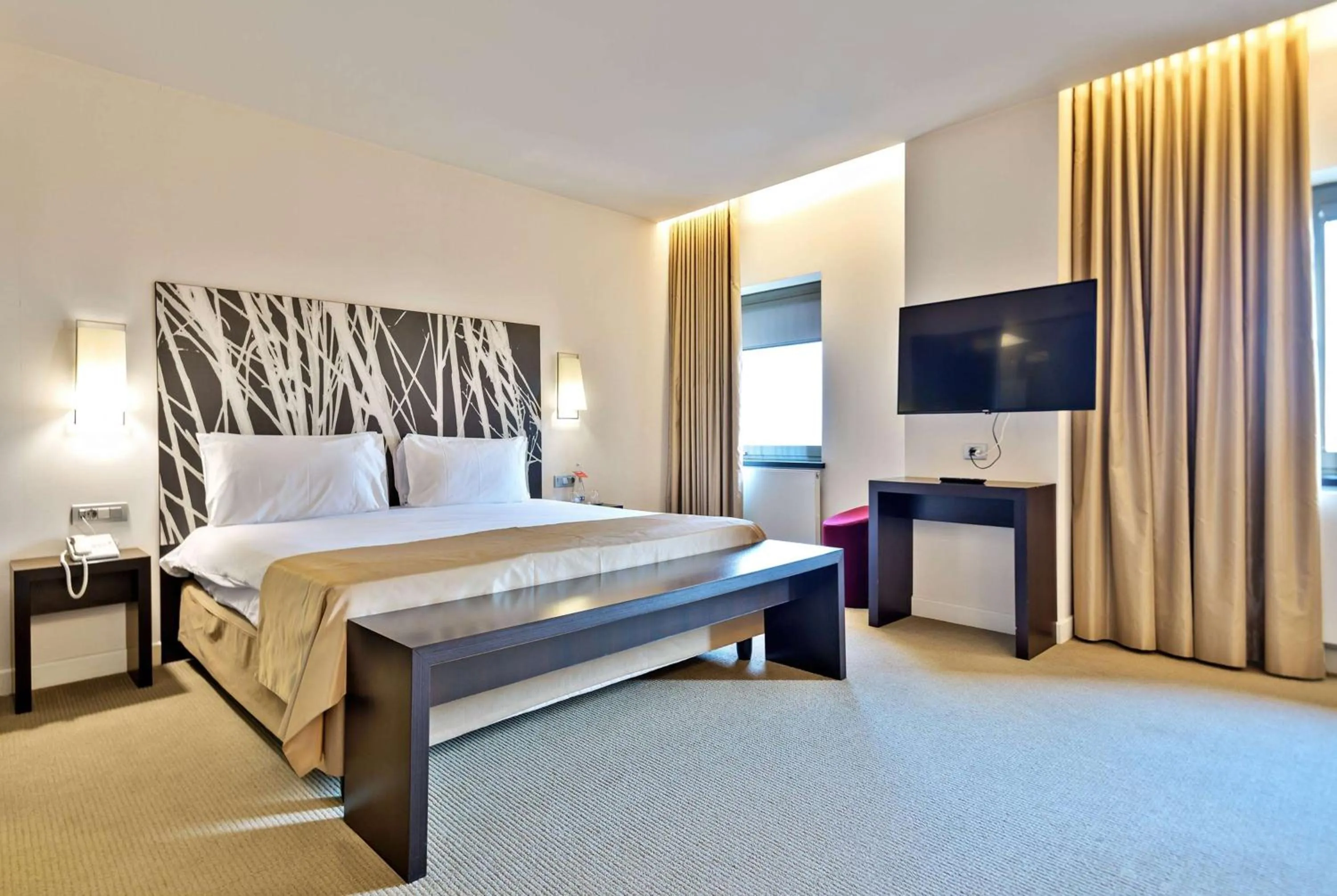 Photo of the whole room, Bed in Ramada Plaza by Wyndham Bucharest Convention Center
