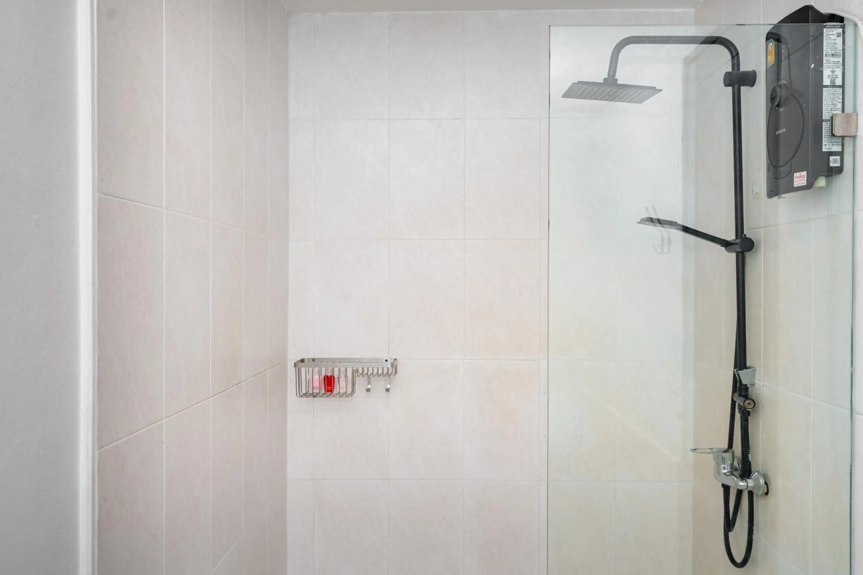 Shower in Kata Station Boutique Hotel