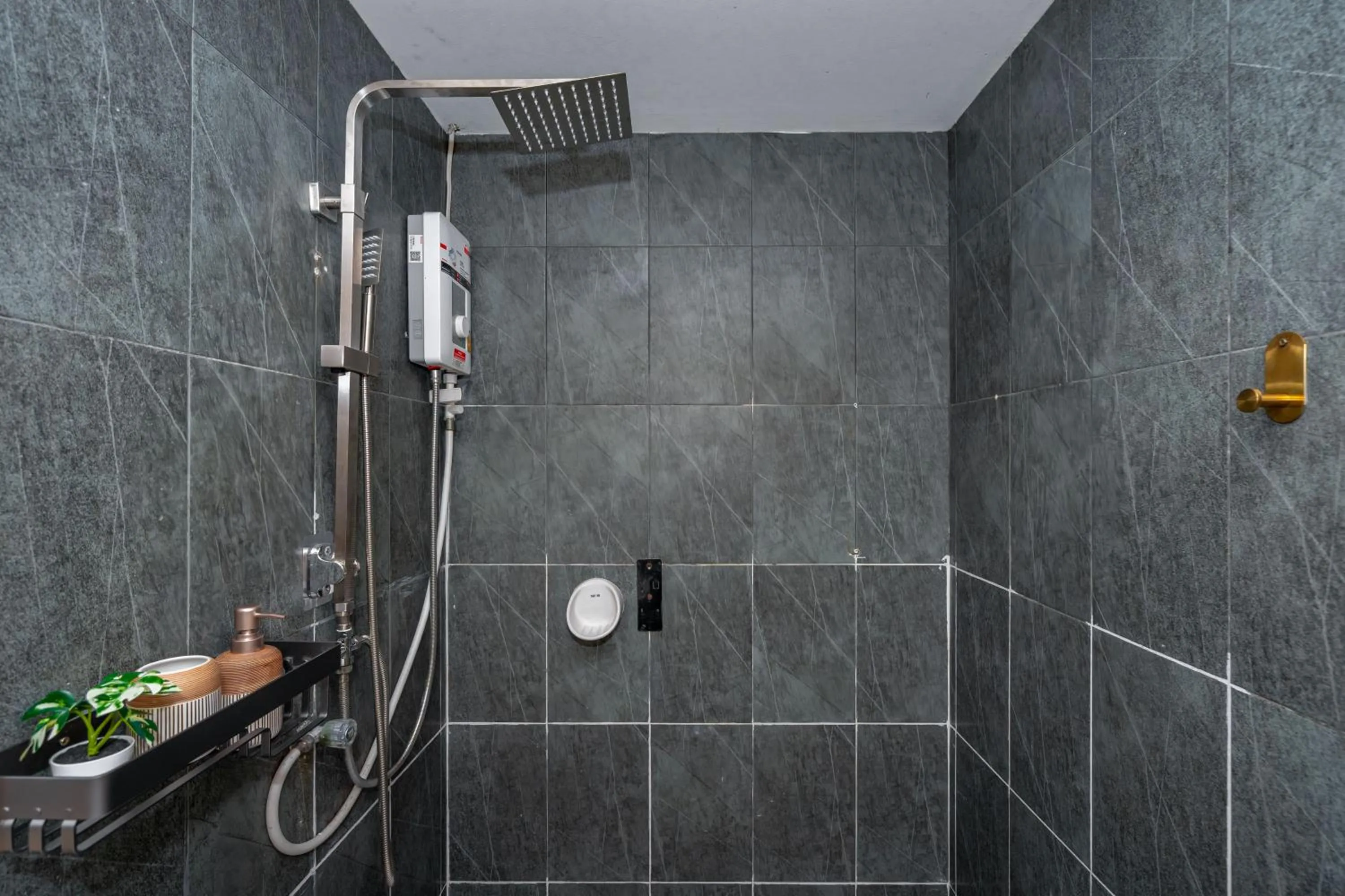 Shower in Kata Station Boutique Hotel