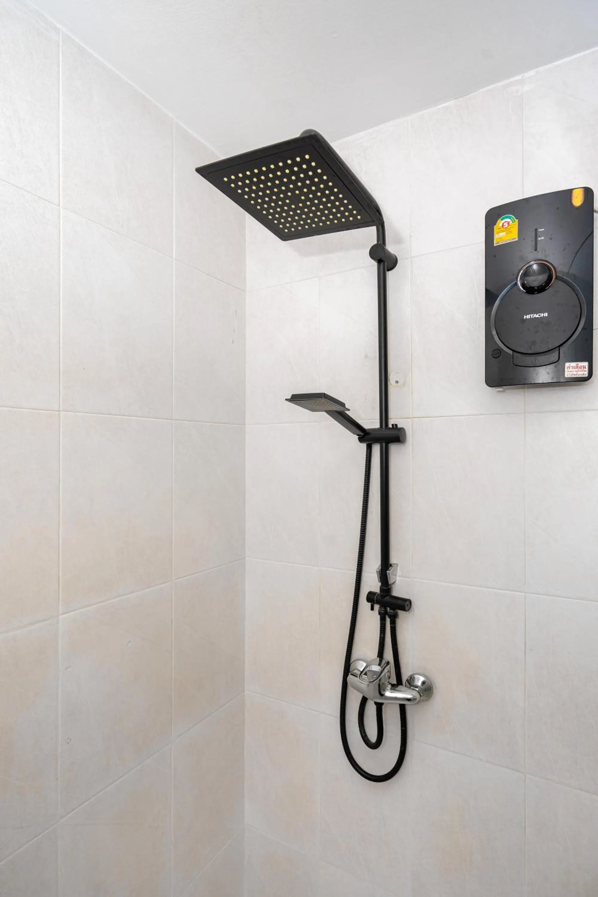 Shower in Kata Station Boutique Hotel