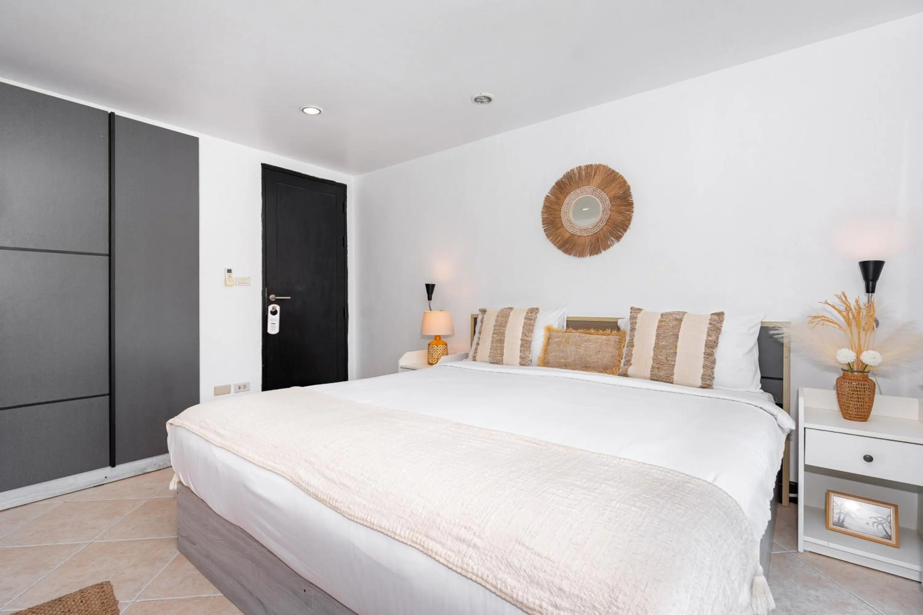 Bed in Kata Station Boutique Hotel