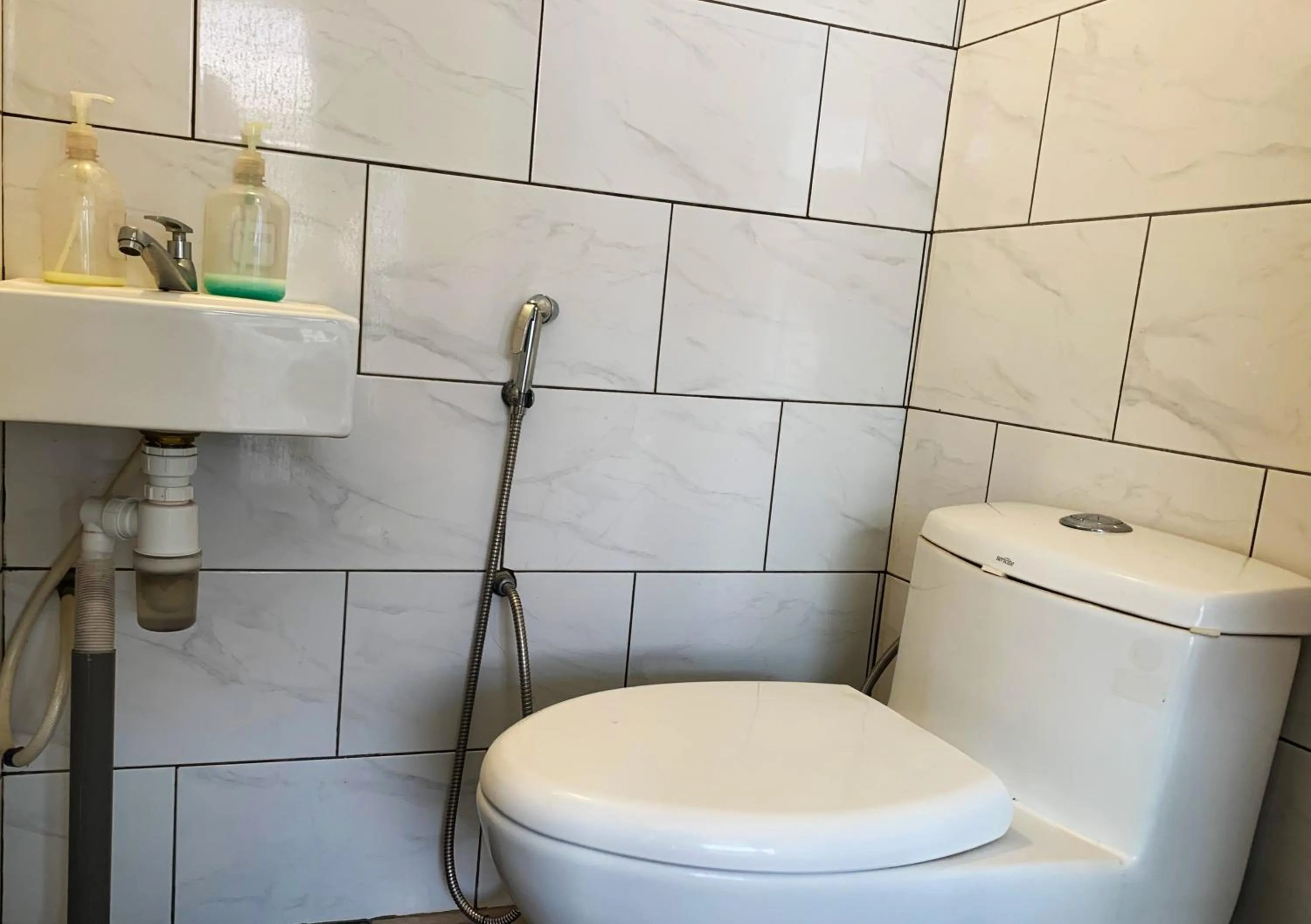 Bathroom in AE Semporna Guesthouse 极潜旅店