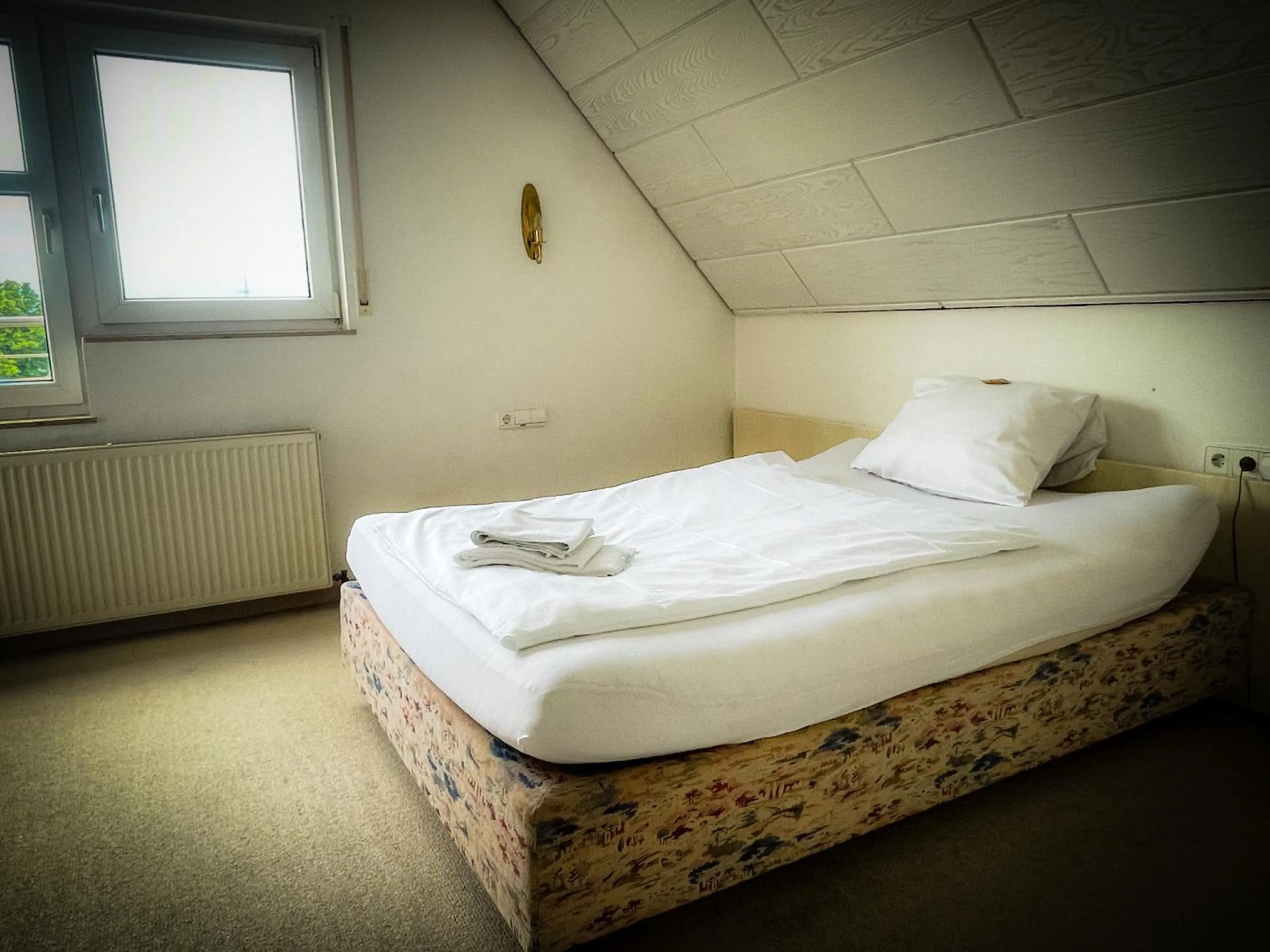 Bed in Hotel Altbacher Hof