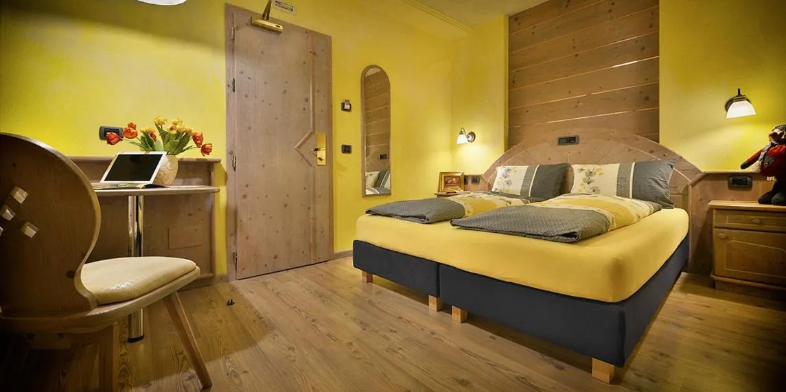 Bed in Hotel Piccolo Mondo