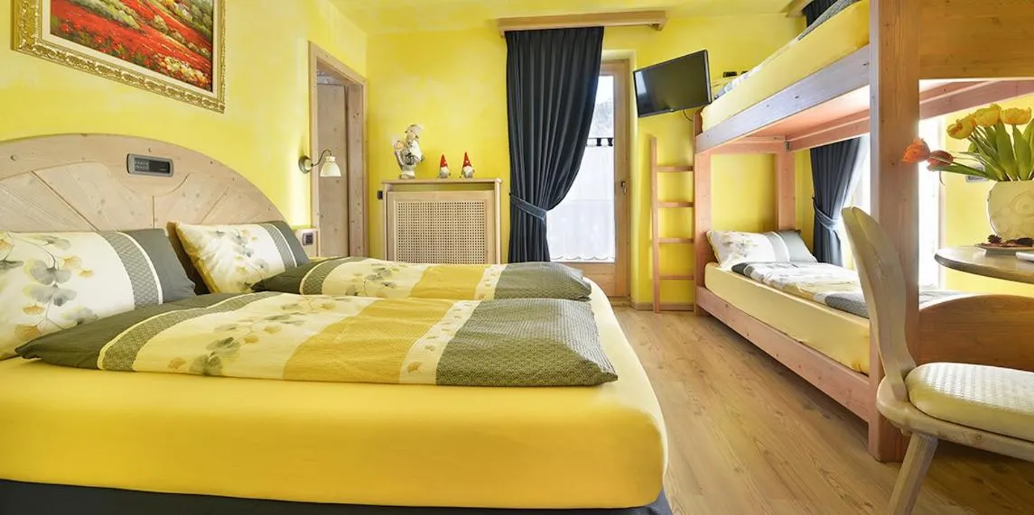 Bed in Hotel Piccolo Mondo