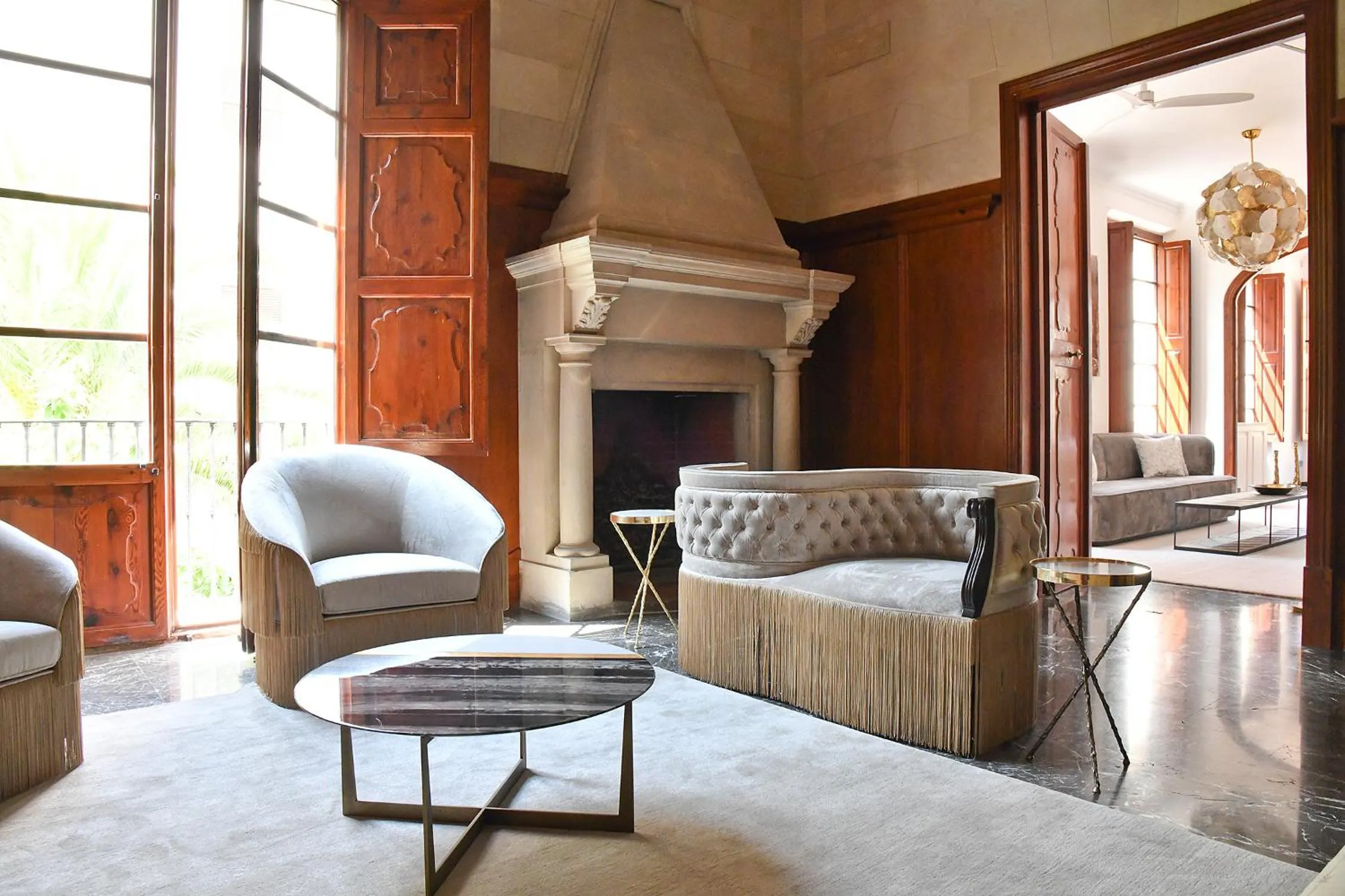 Communal lounge/ TV room in Palacio Can Marqués by Puro