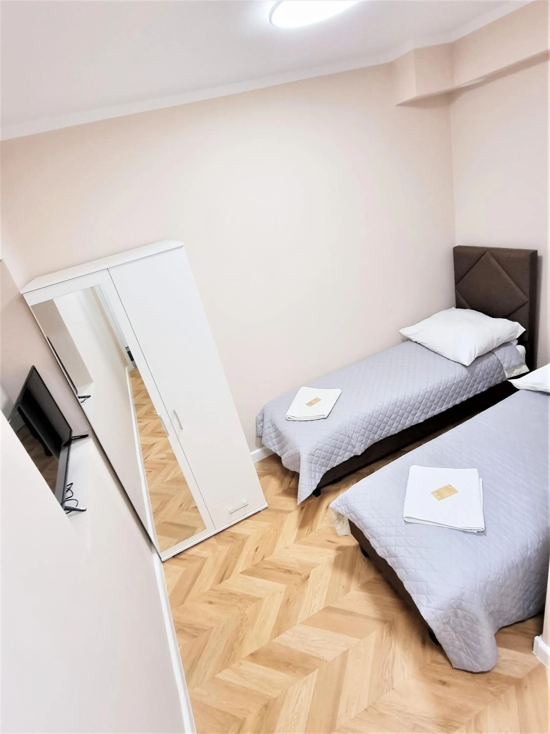 Bed in Orange Tree Hotel