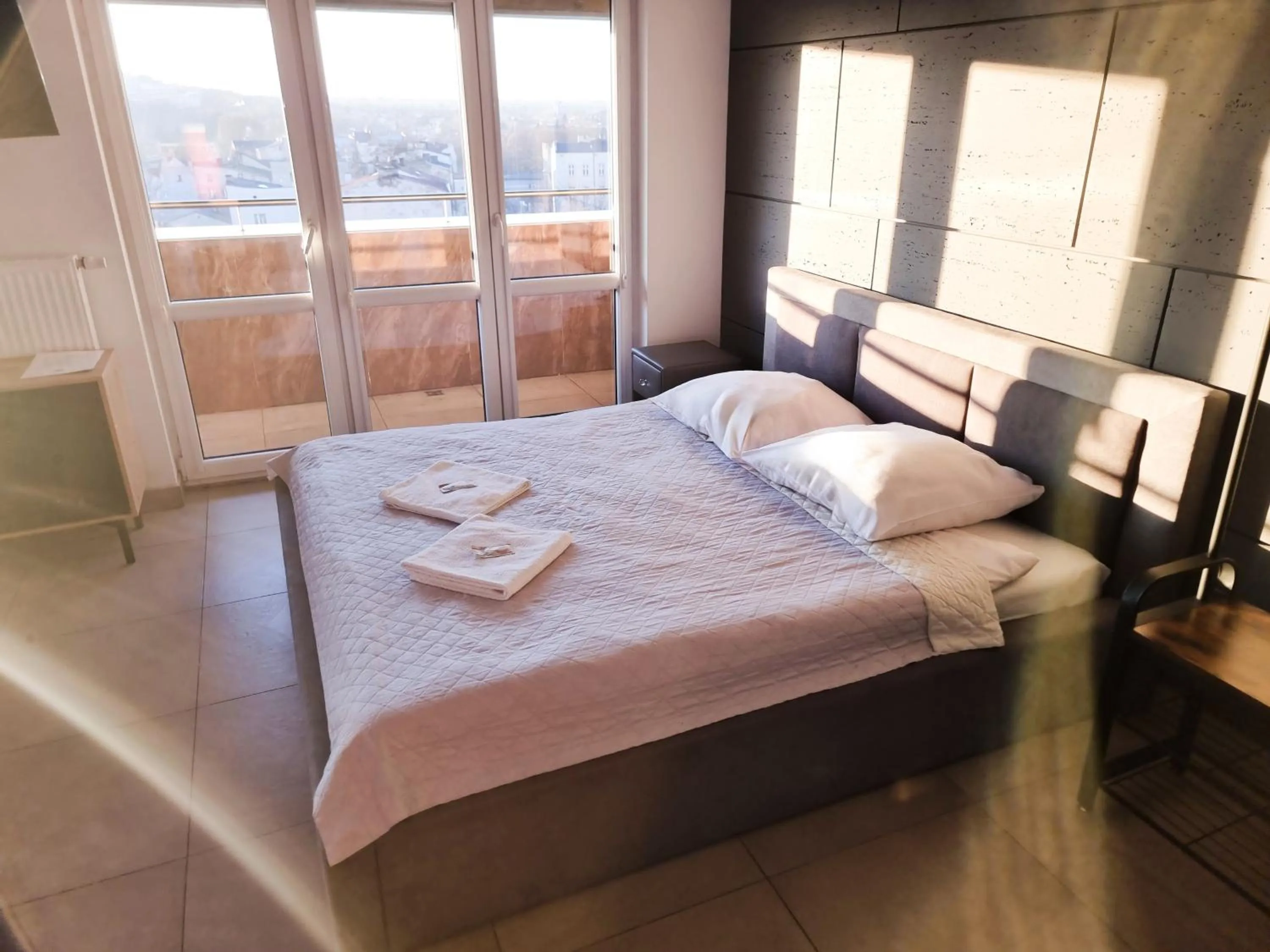 Bed in Orange Tree Hotel