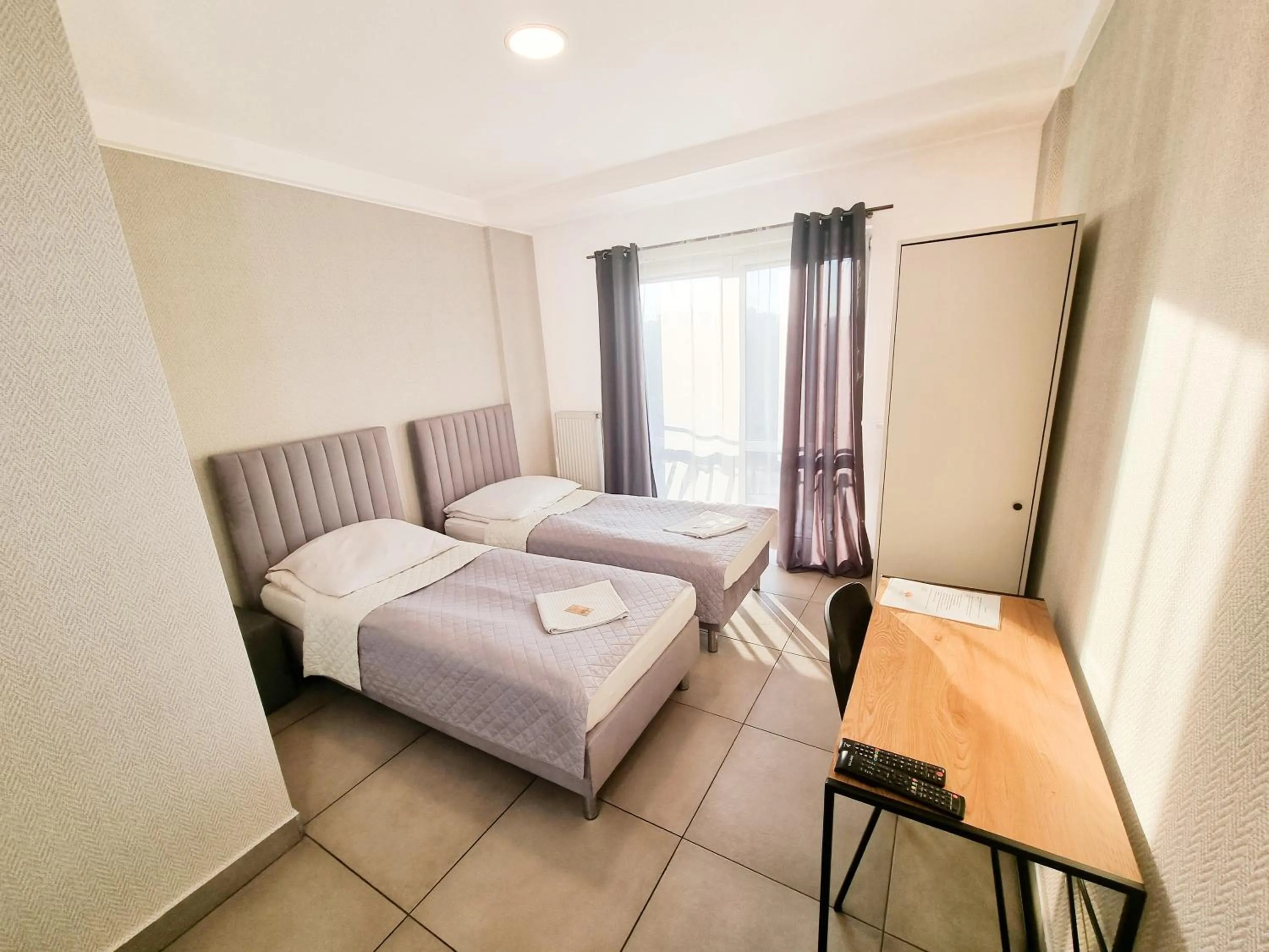 Bed in Orange Tree Hotel