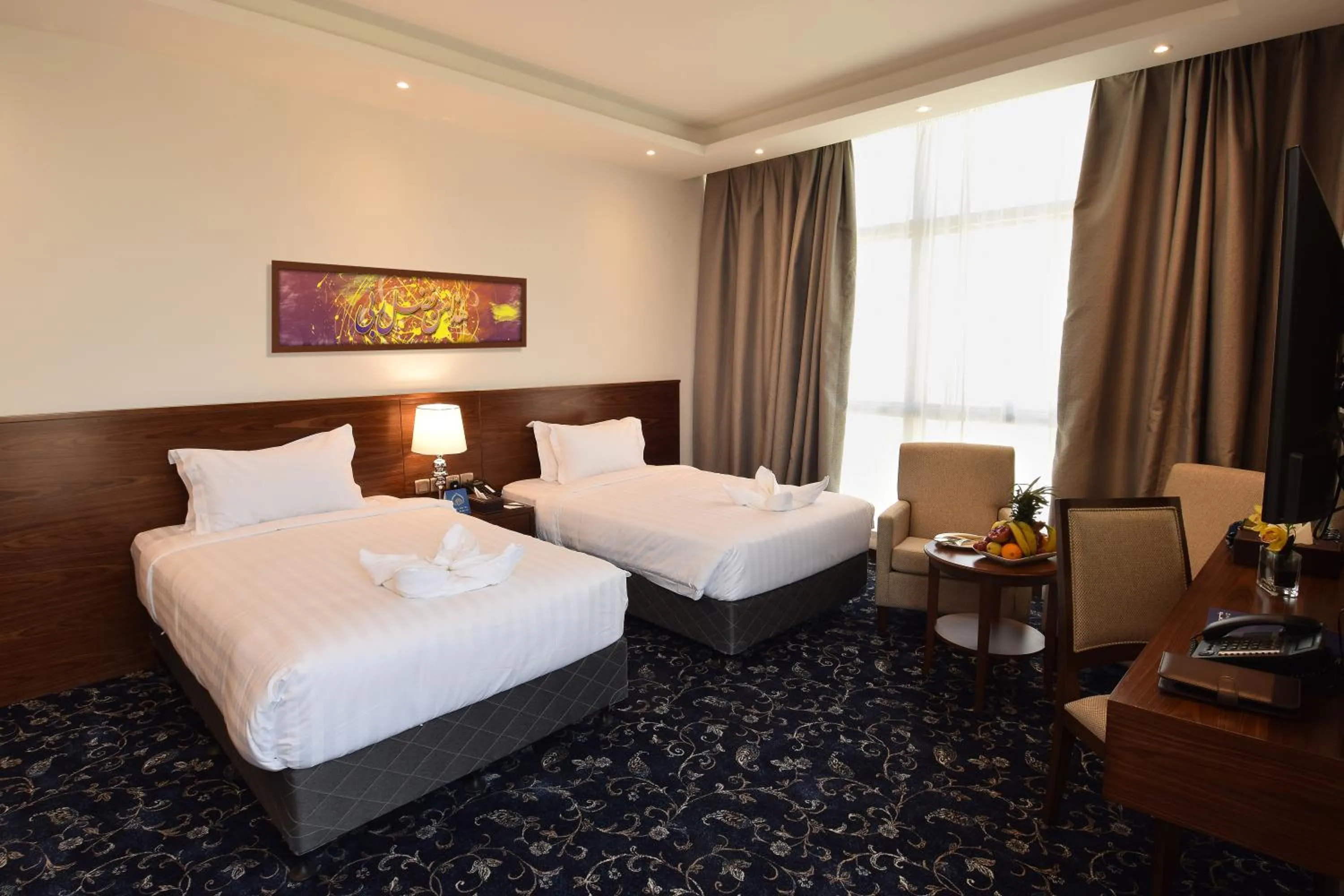 Bed in Zaha Al Munawara Hotel