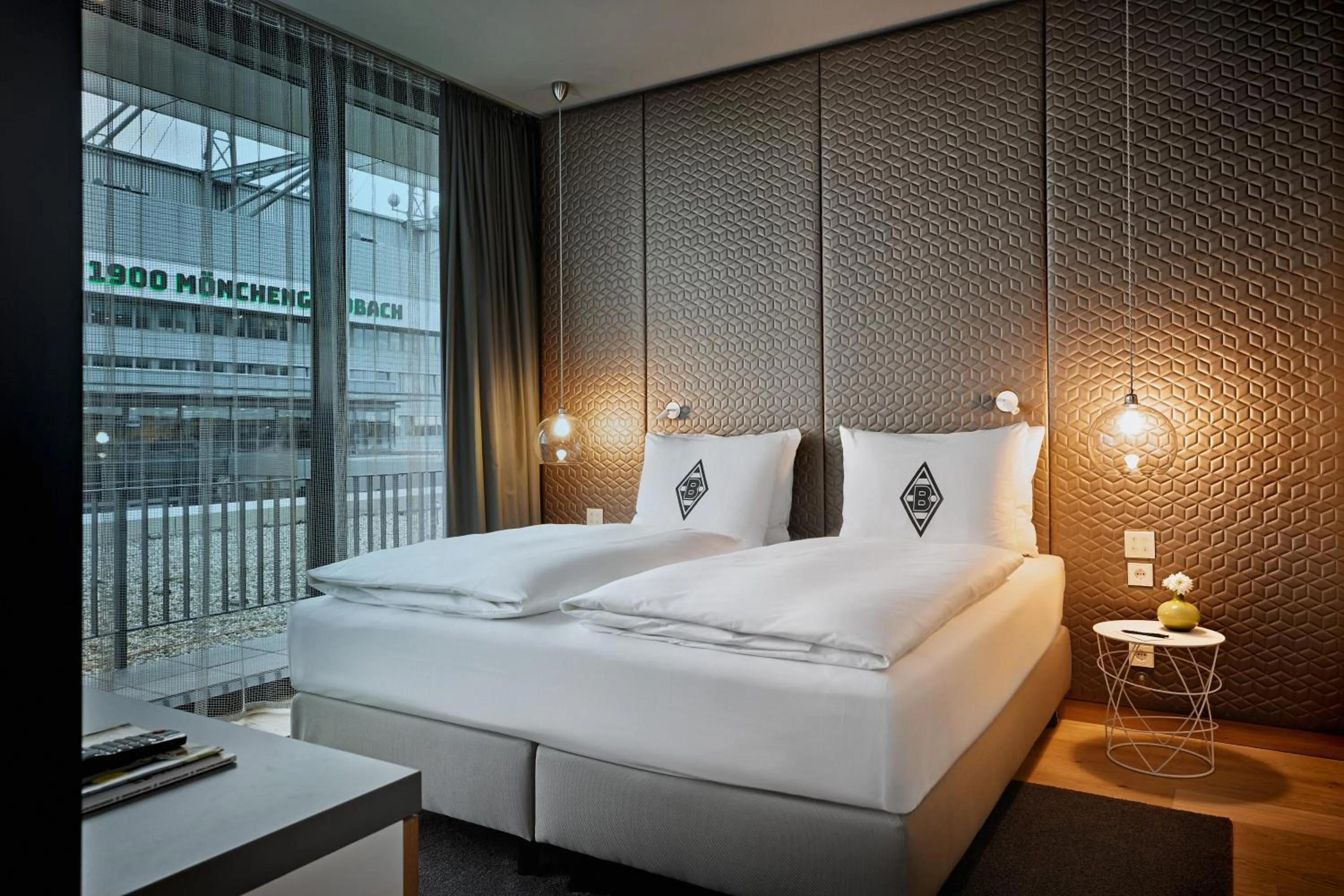 Bed in H4 Hotel Mönchengladbach im BORUSSIA-PARK