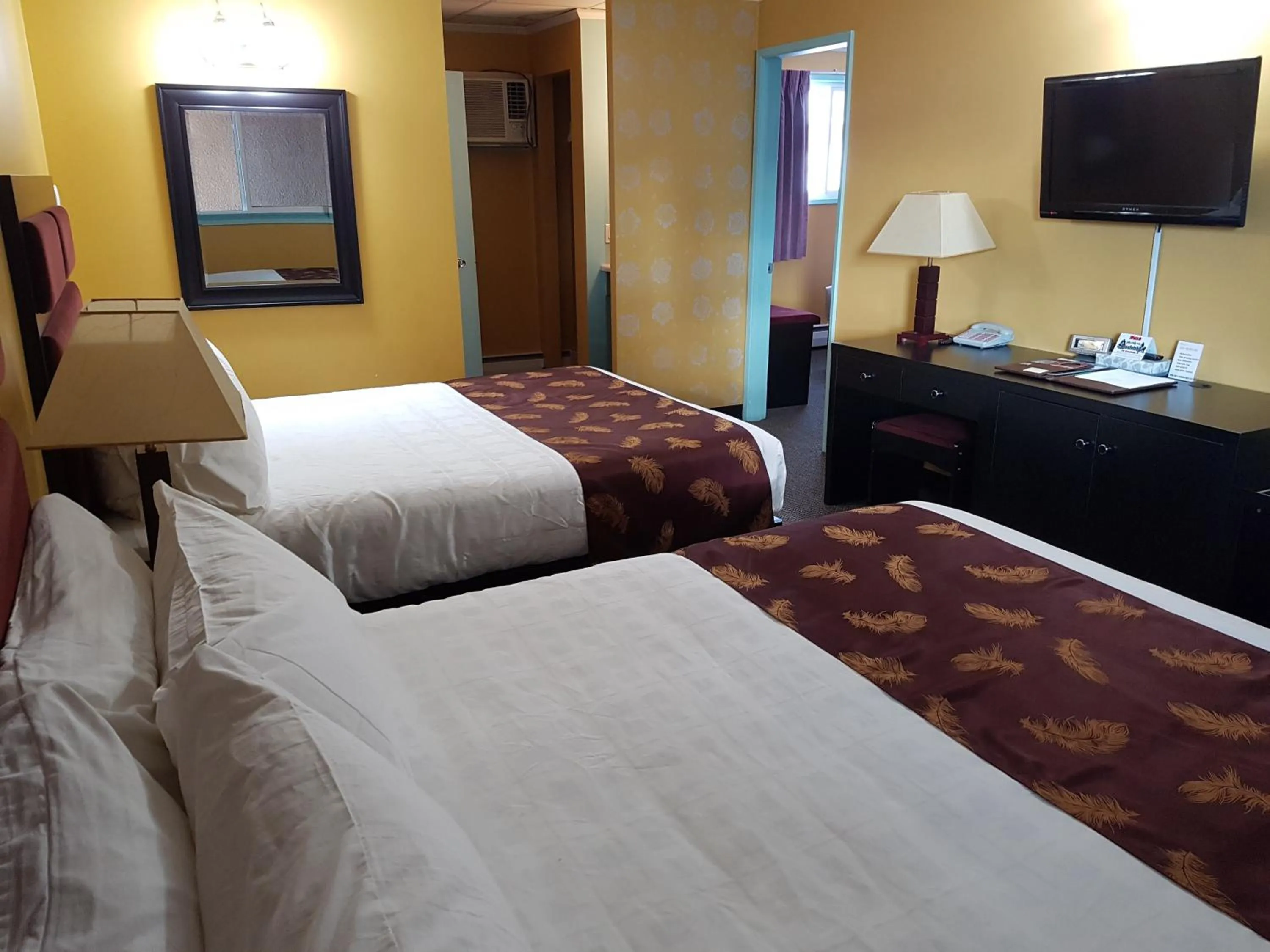 Three Beds in Adjoining Rooms in Alpine Inn & Suites